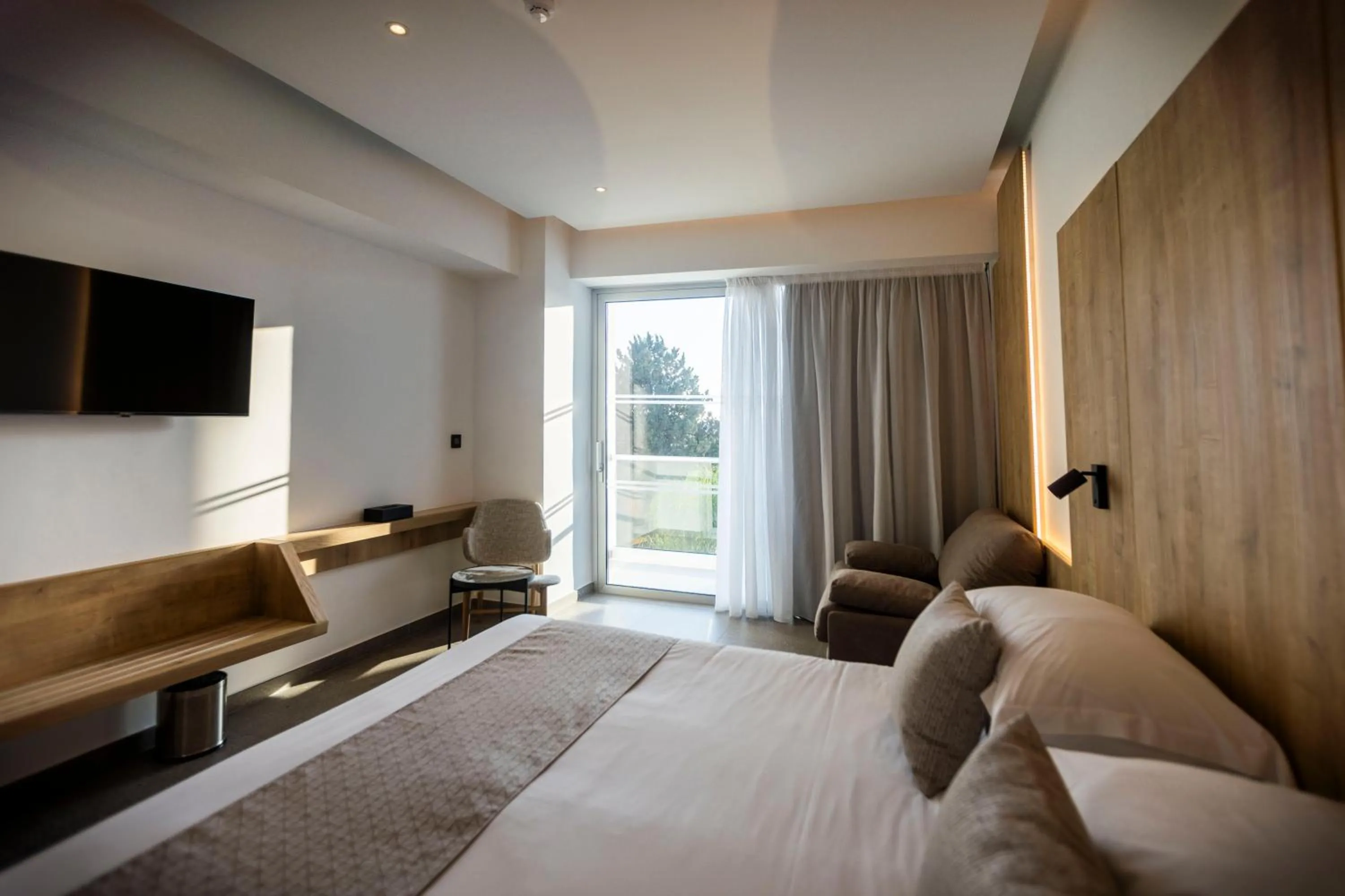 Bed in Sofianna Resort & Spa