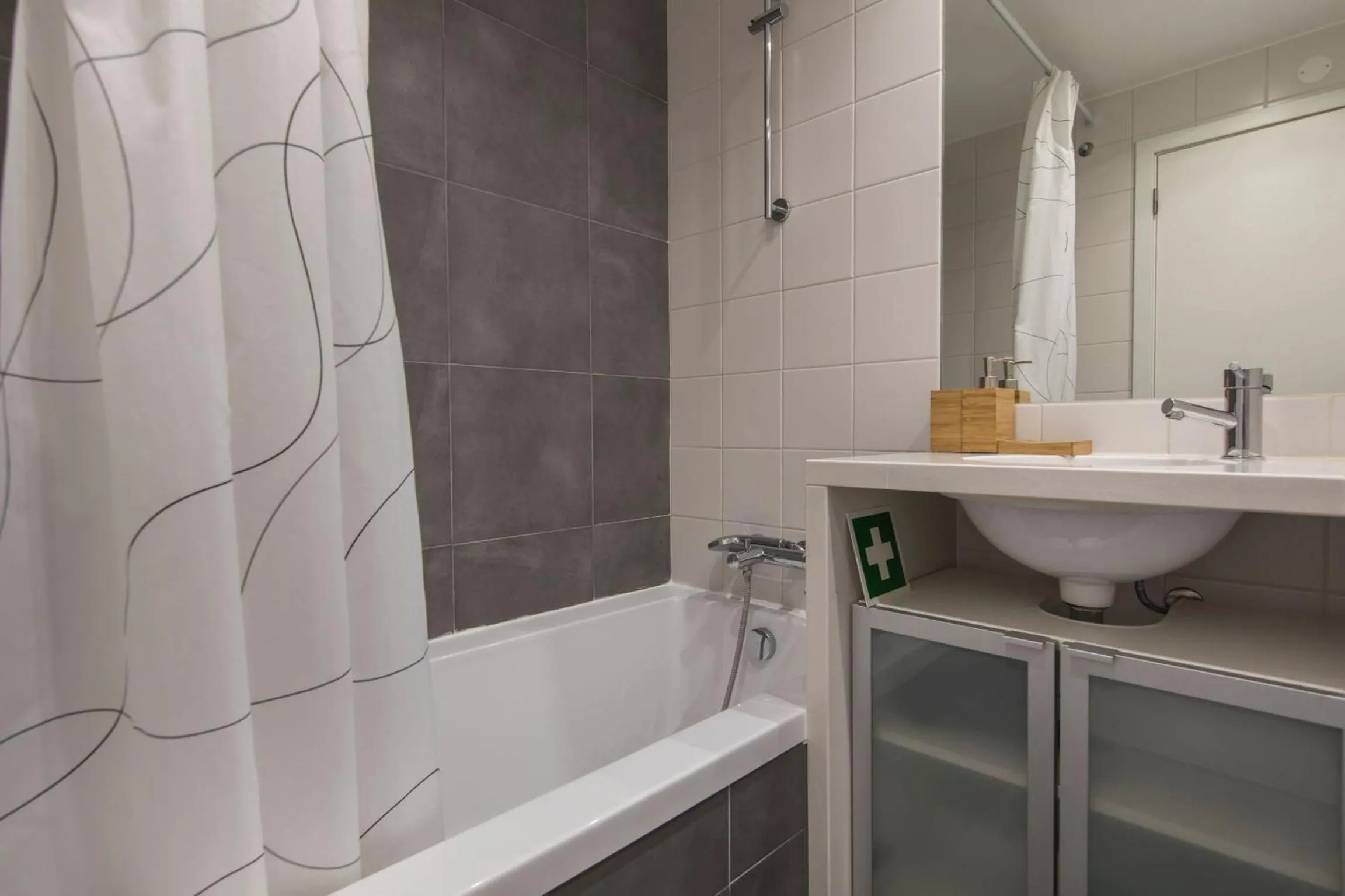 Shower in LovelyStay - Family-Friendly Apartment Downtown