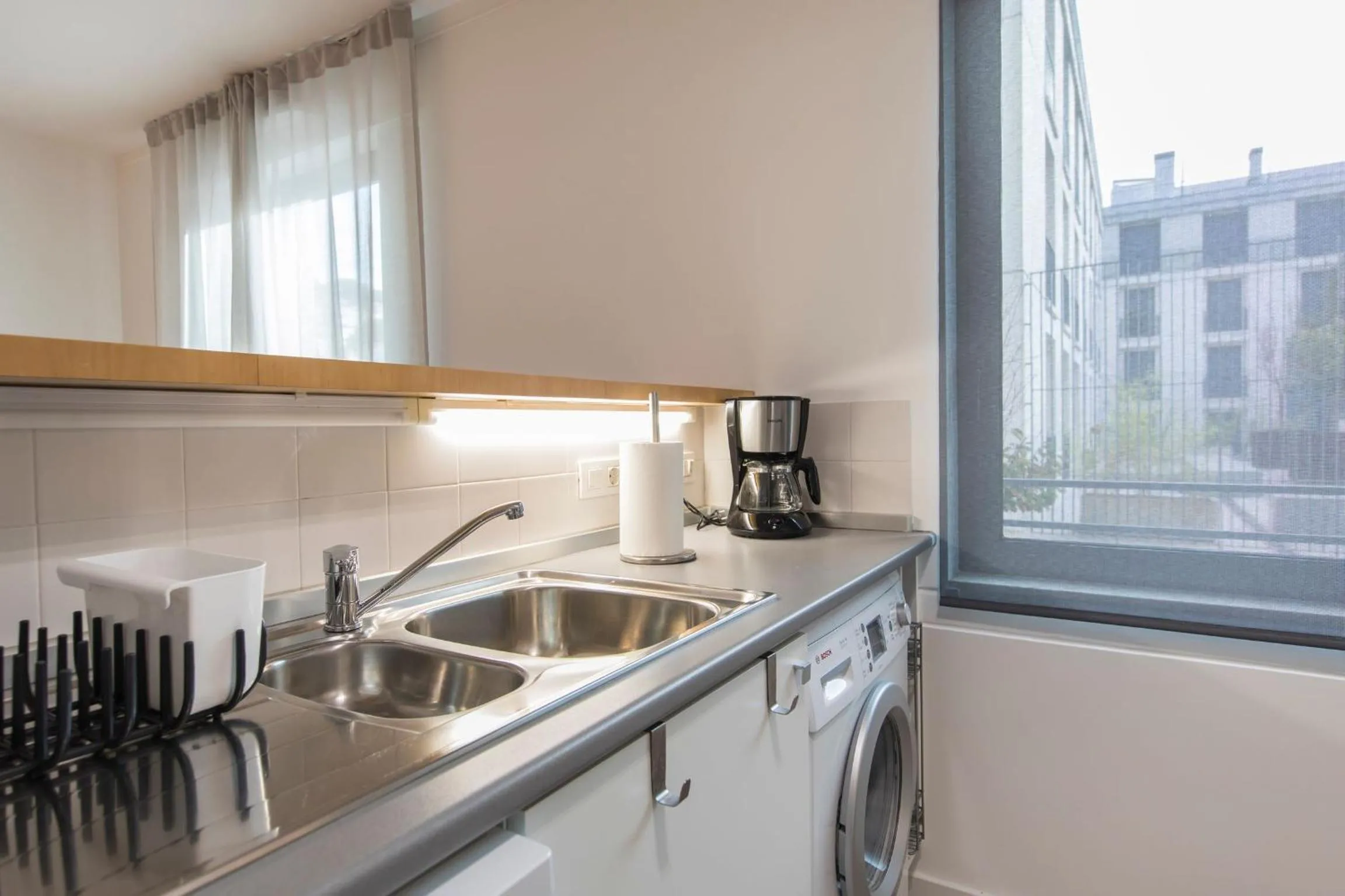 Kitchen or kitchenette in LovelyStay - Family-Friendly Apartment Downtown