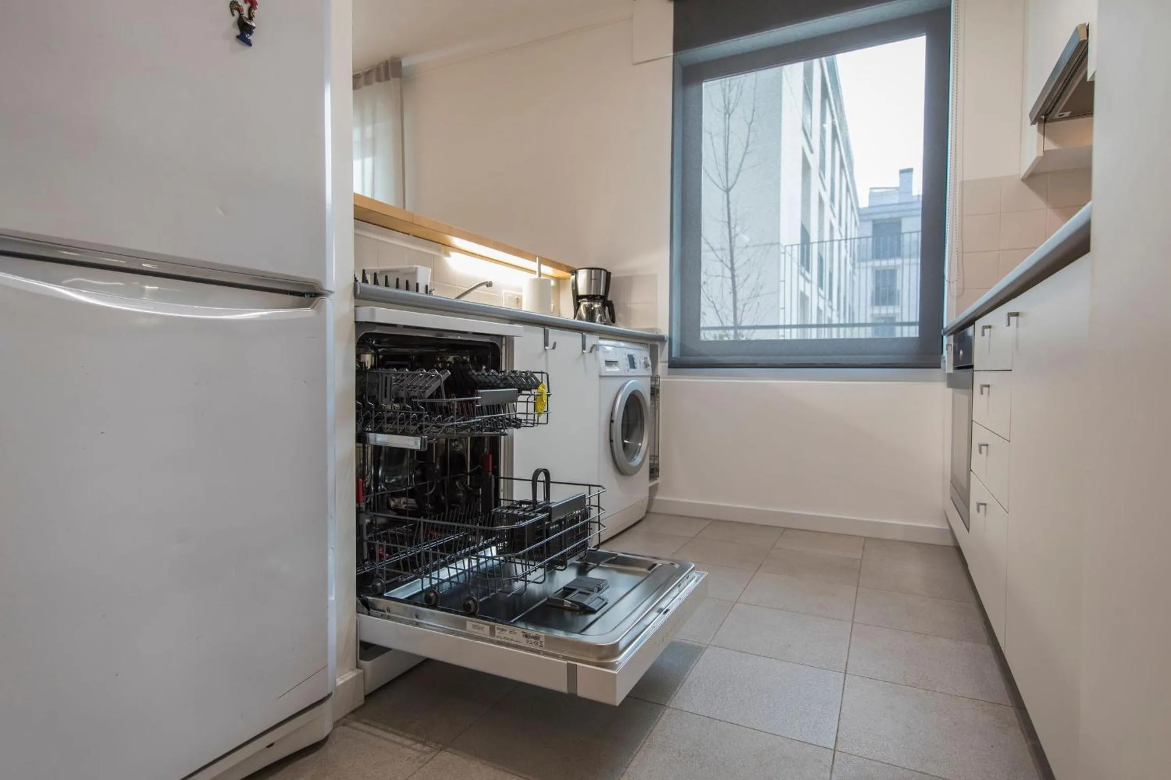 Kitchen or kitchenette in LovelyStay - Family-Friendly Apartment Downtown