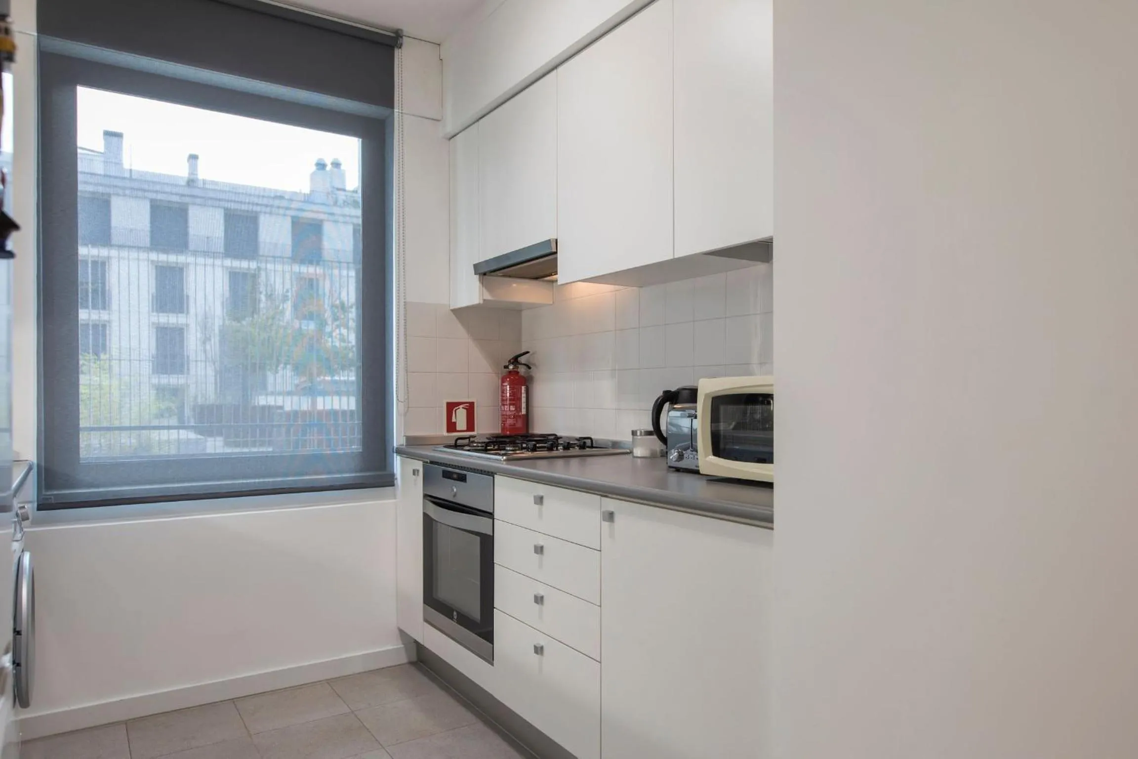 Kitchen or kitchenette in LovelyStay - Family-Friendly Apartment Downtown