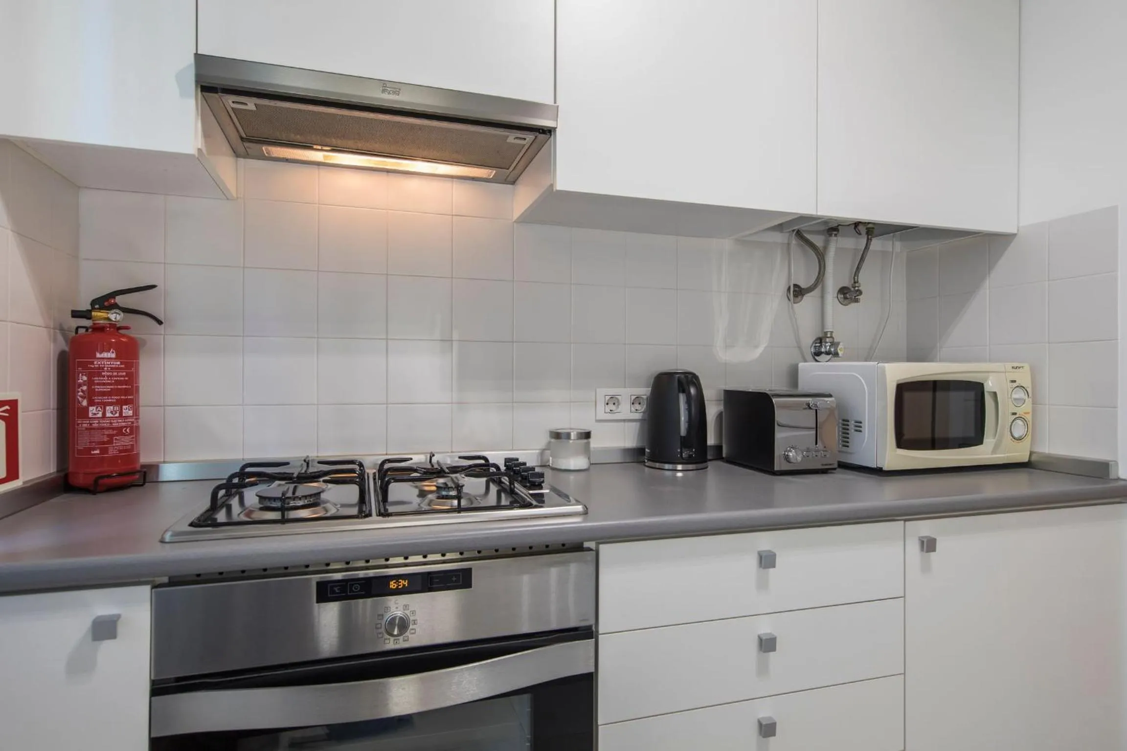 Kitchen or kitchenette in LovelyStay - Family-Friendly Apartment Downtown