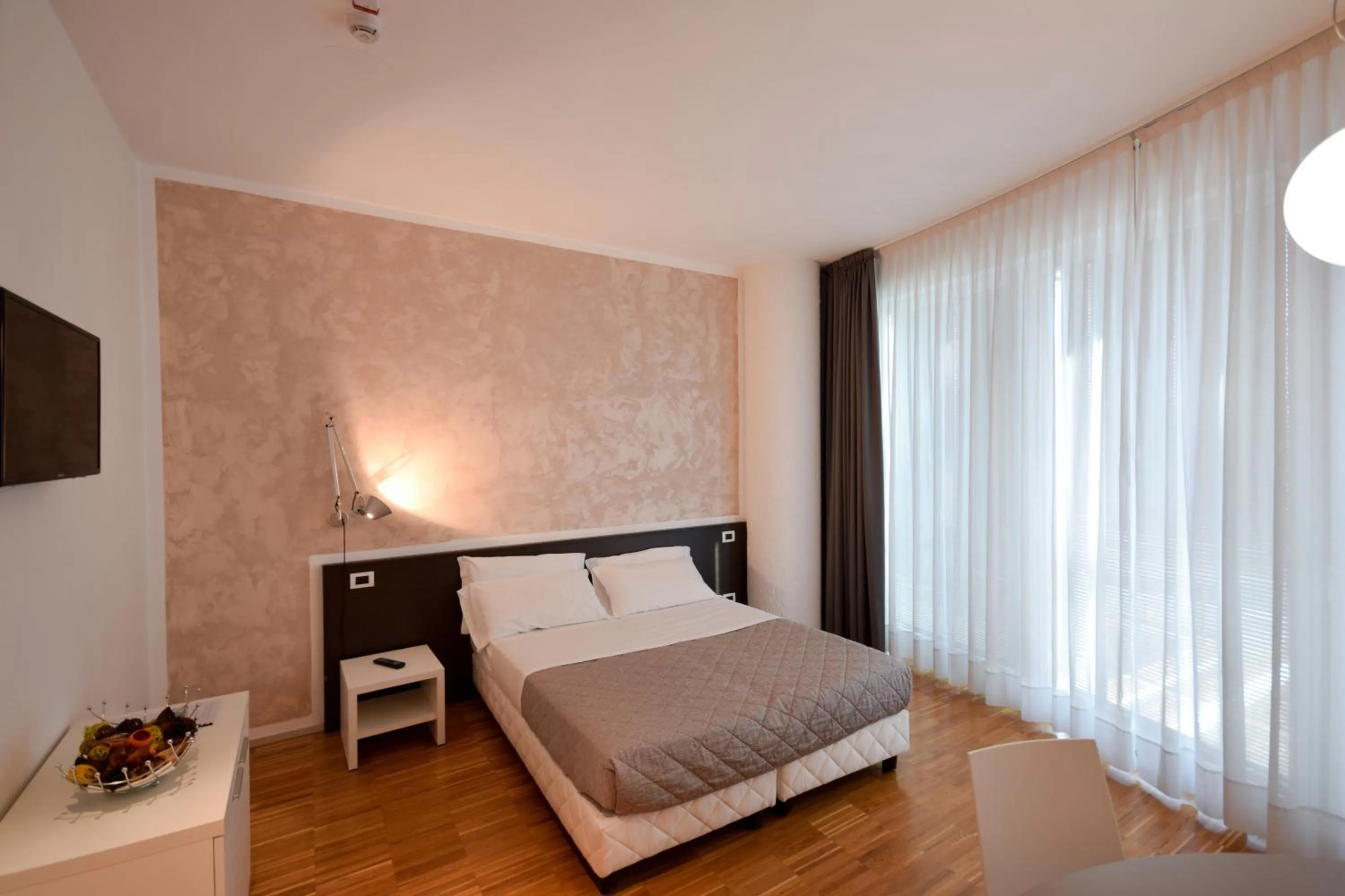 Bed in Hotel Mantova Residence