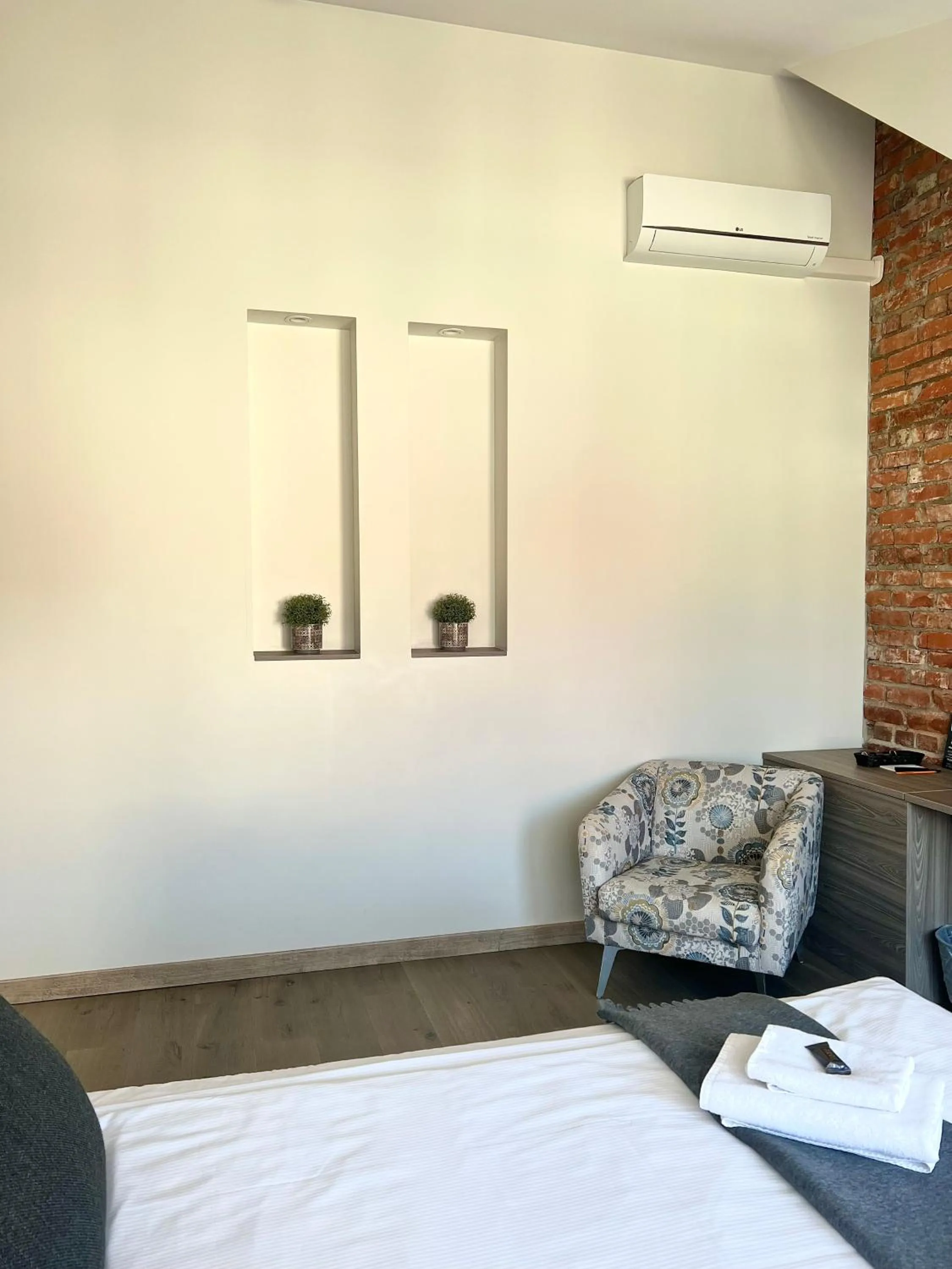 Living room, Bed in Dangė Hotel