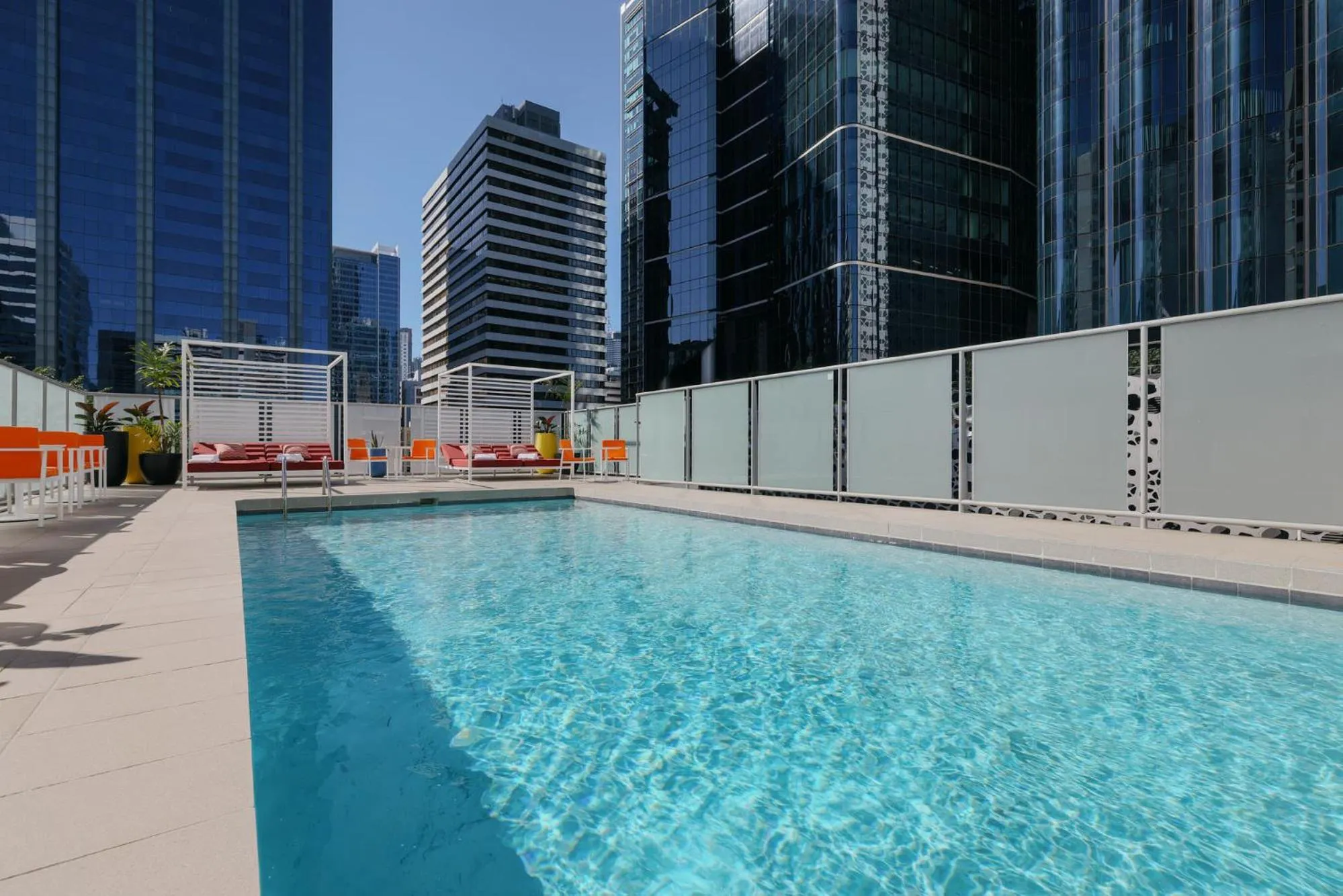 Swimming pool in Hotel Indigo Brisbane City Centre by IHG