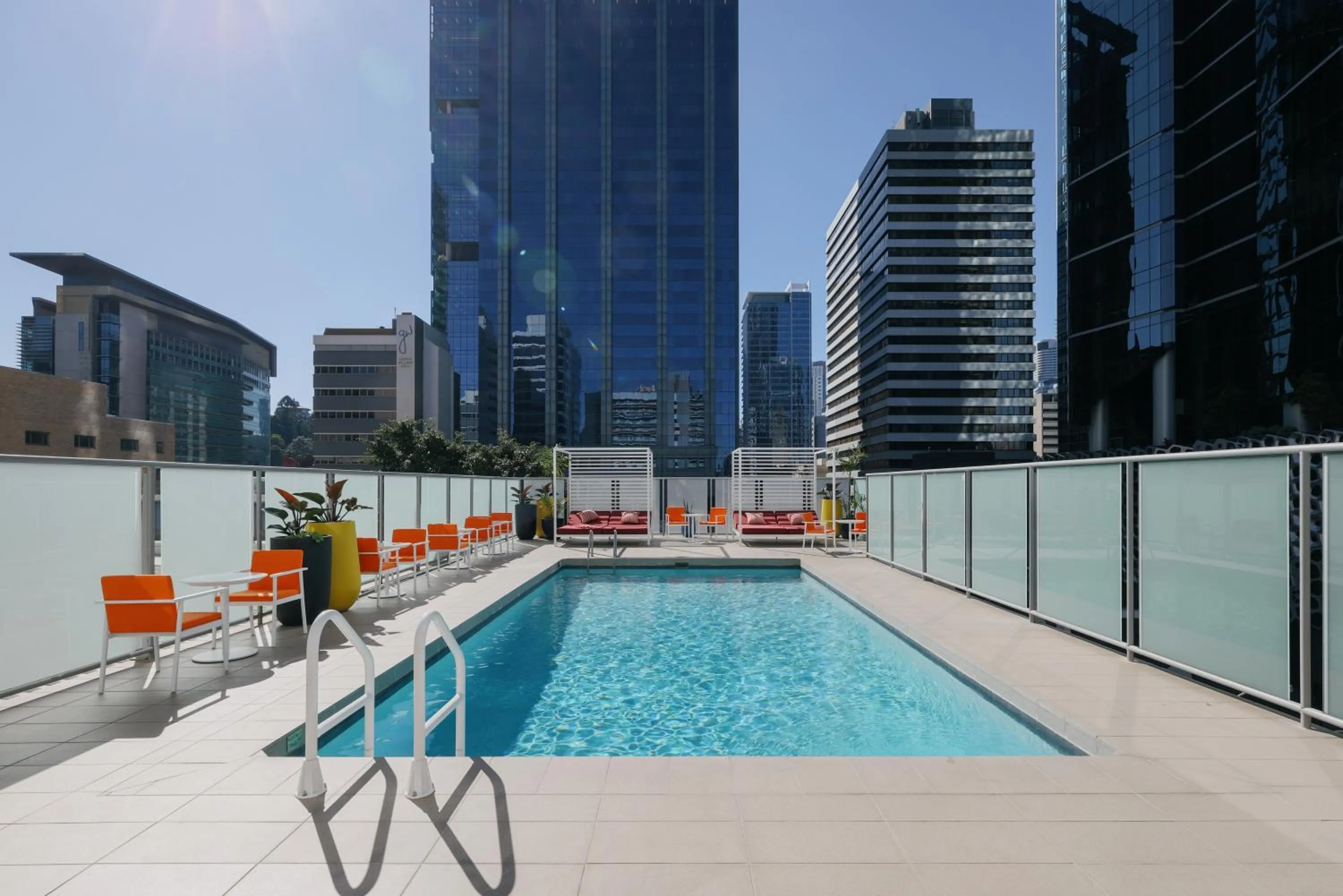 Swimming pool in Hotel Indigo Brisbane City Centre by IHG