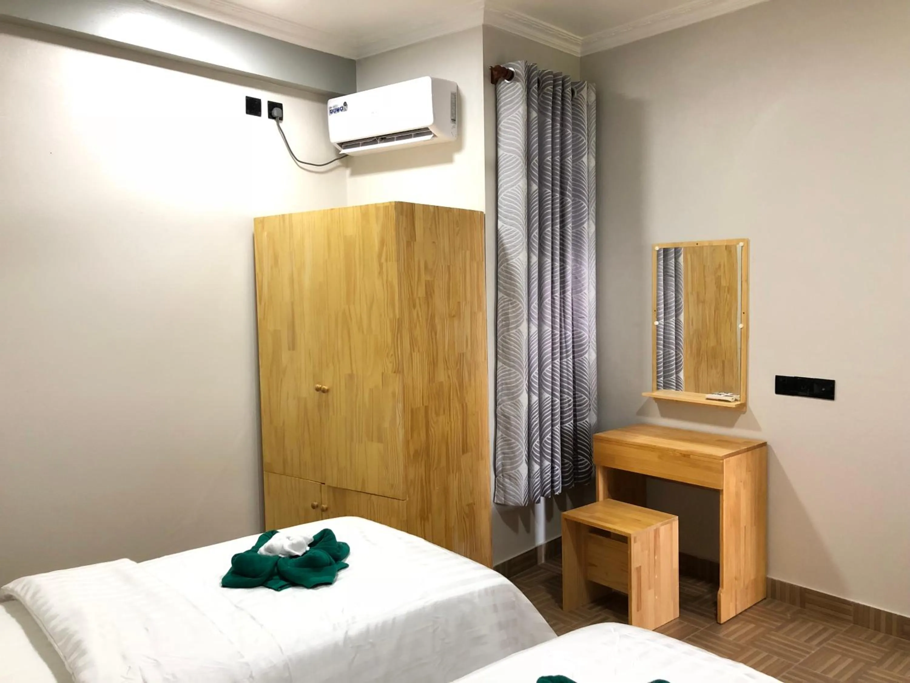 Bed in IRIS Beach Residence