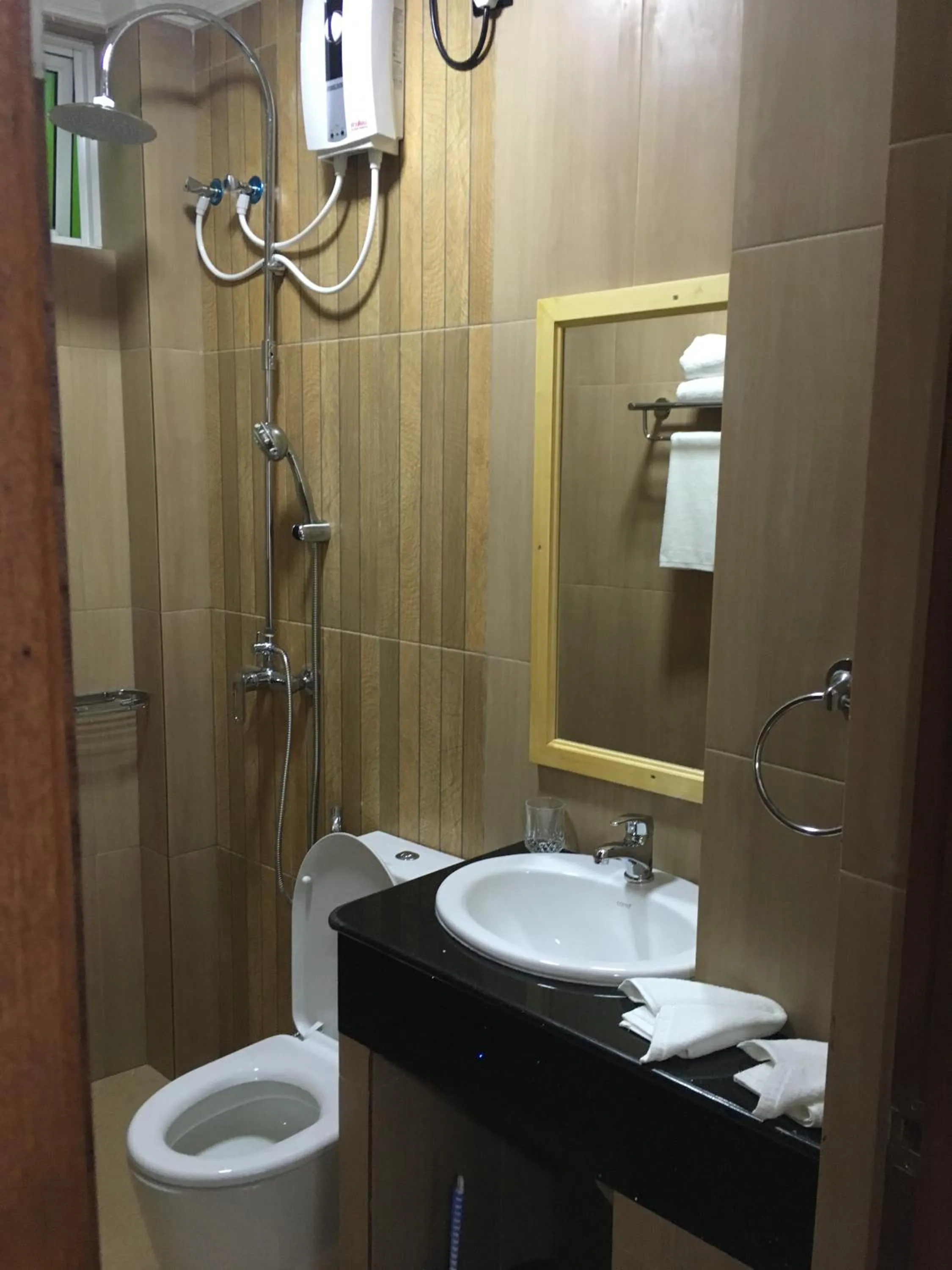 Shower in IRIS Beach Residence