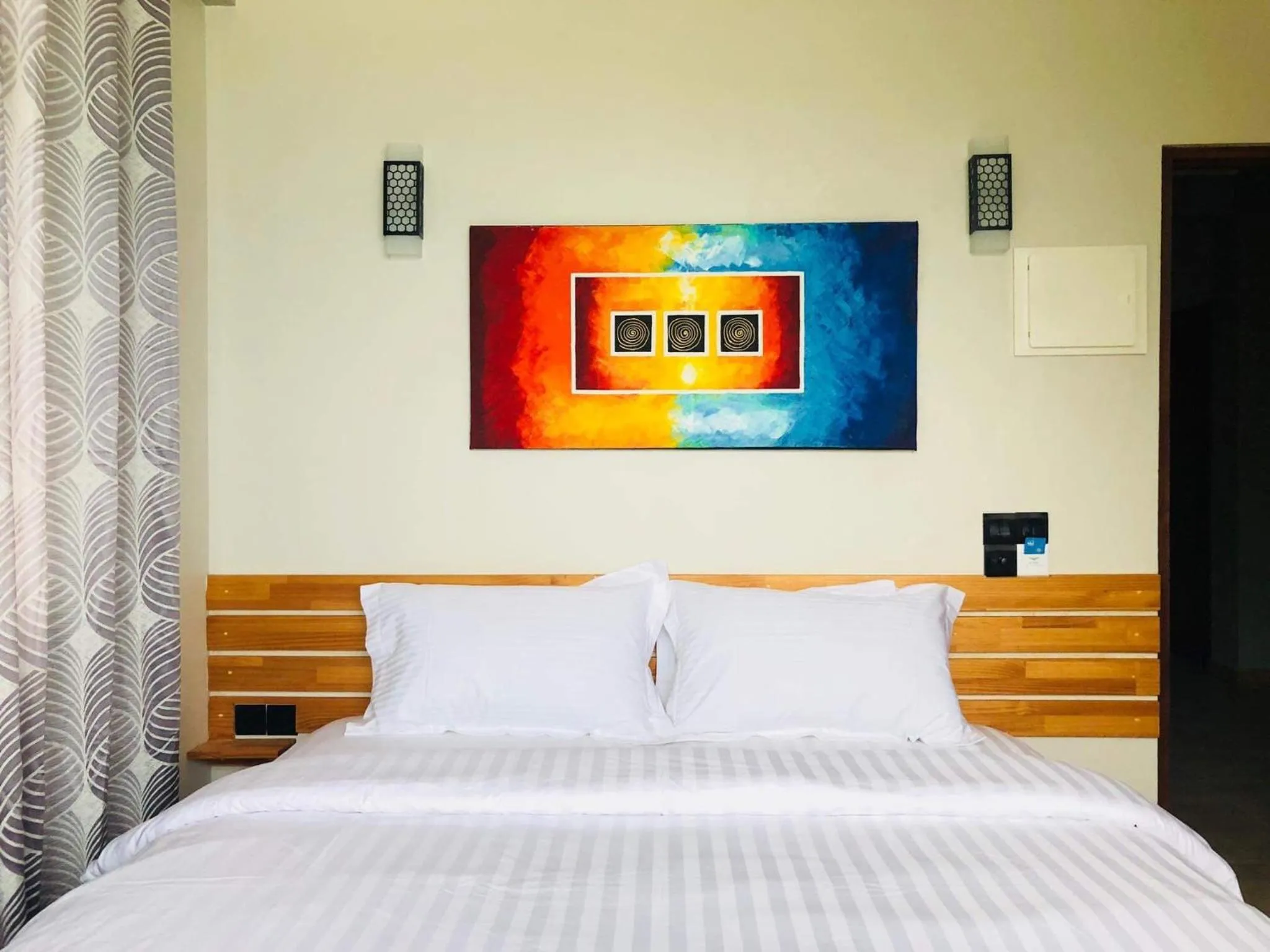 Bed in IRIS Beach Residence