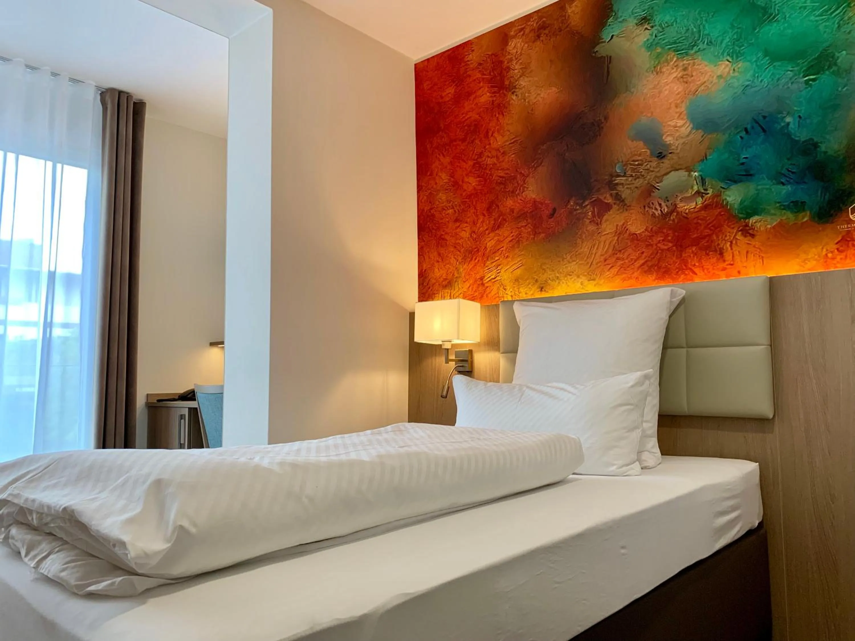 Bed in Thermalhotel Kemper