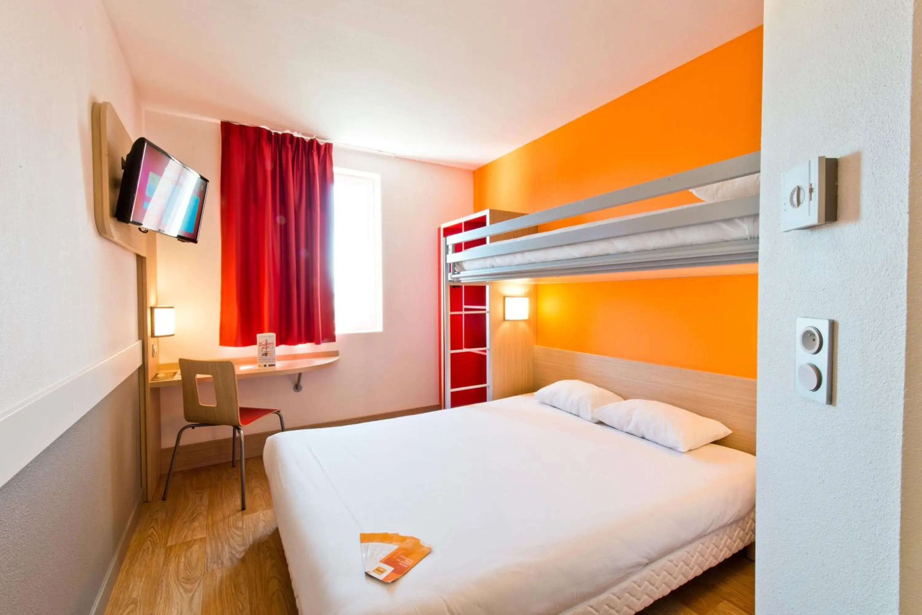 Triple Room with 1 Double Bed and 1 Single Bed in Premiere Classe Sens Nord- Saint Clément Triple Room with 1 Double Bed and 1 Single Bed in Premiere Classe Sens Nord- Saint Clément