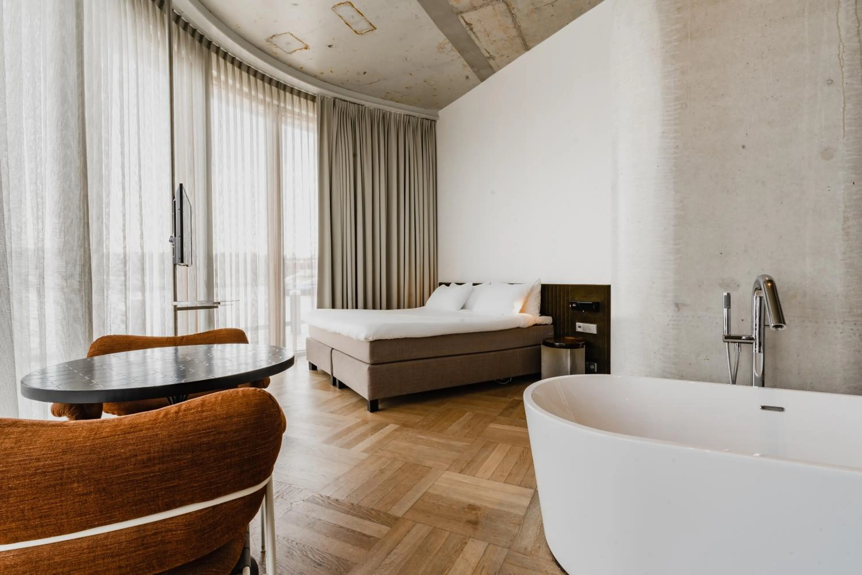 Seating area, Bed in Hotel Pontsteiger