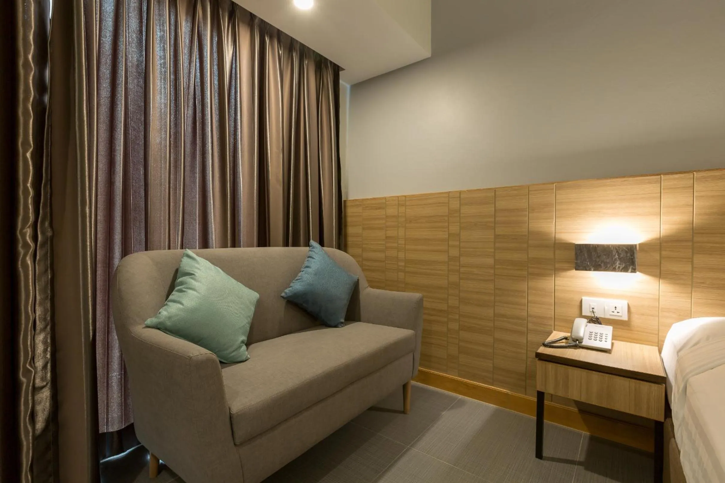 Bed in Paragon Grand Resort