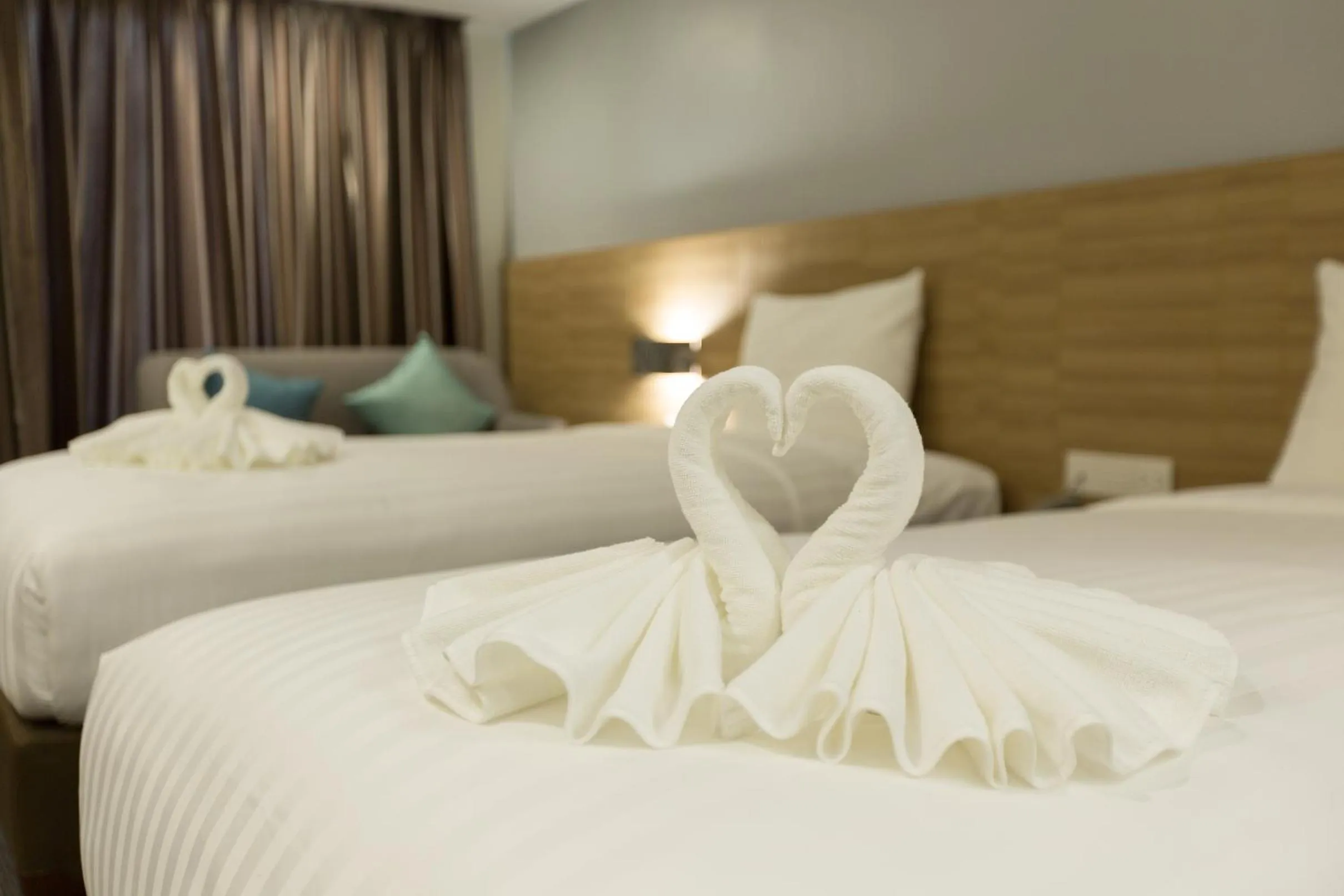 Bed in Paragon Grand Resort