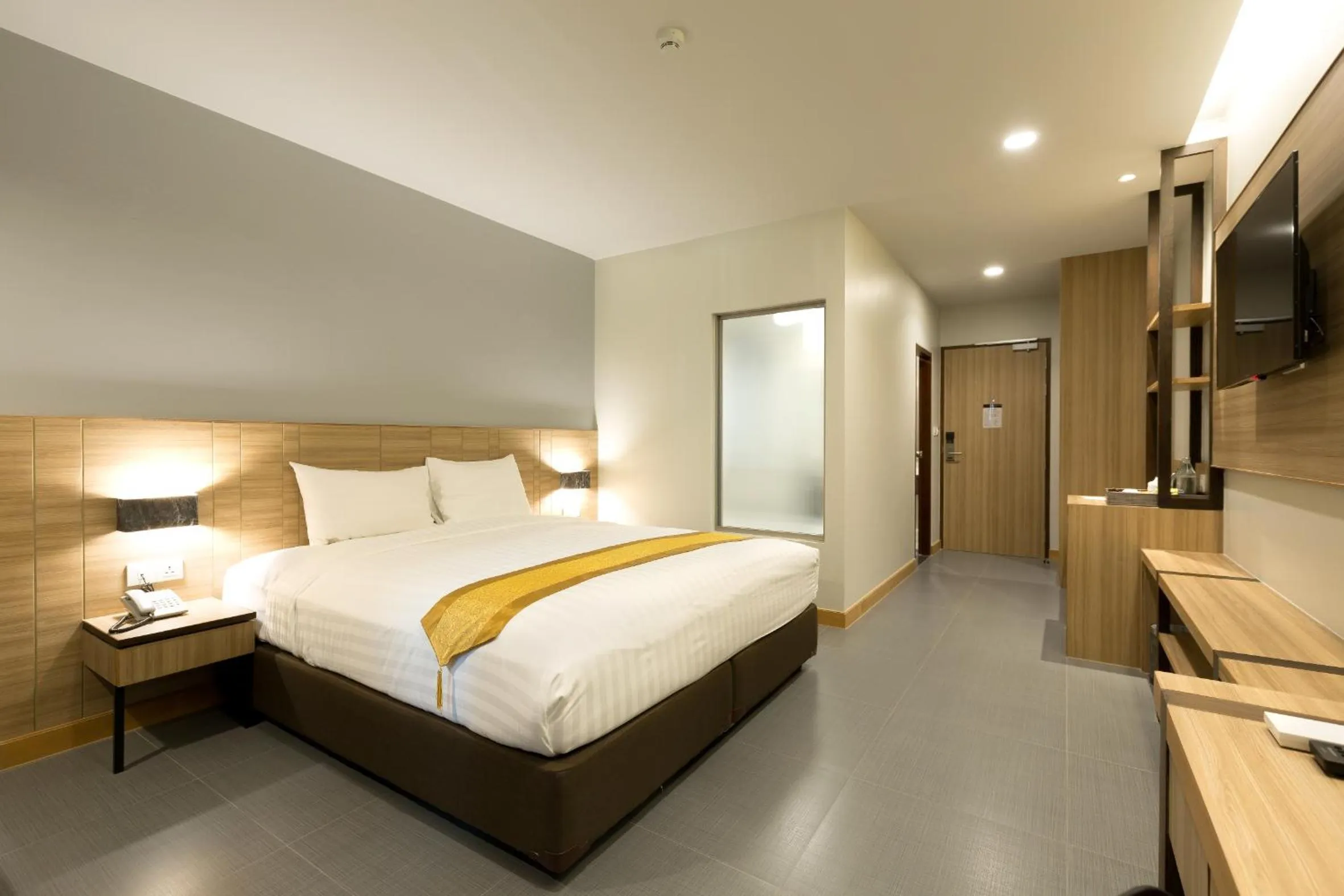 Bed in Paragon Grand Resort