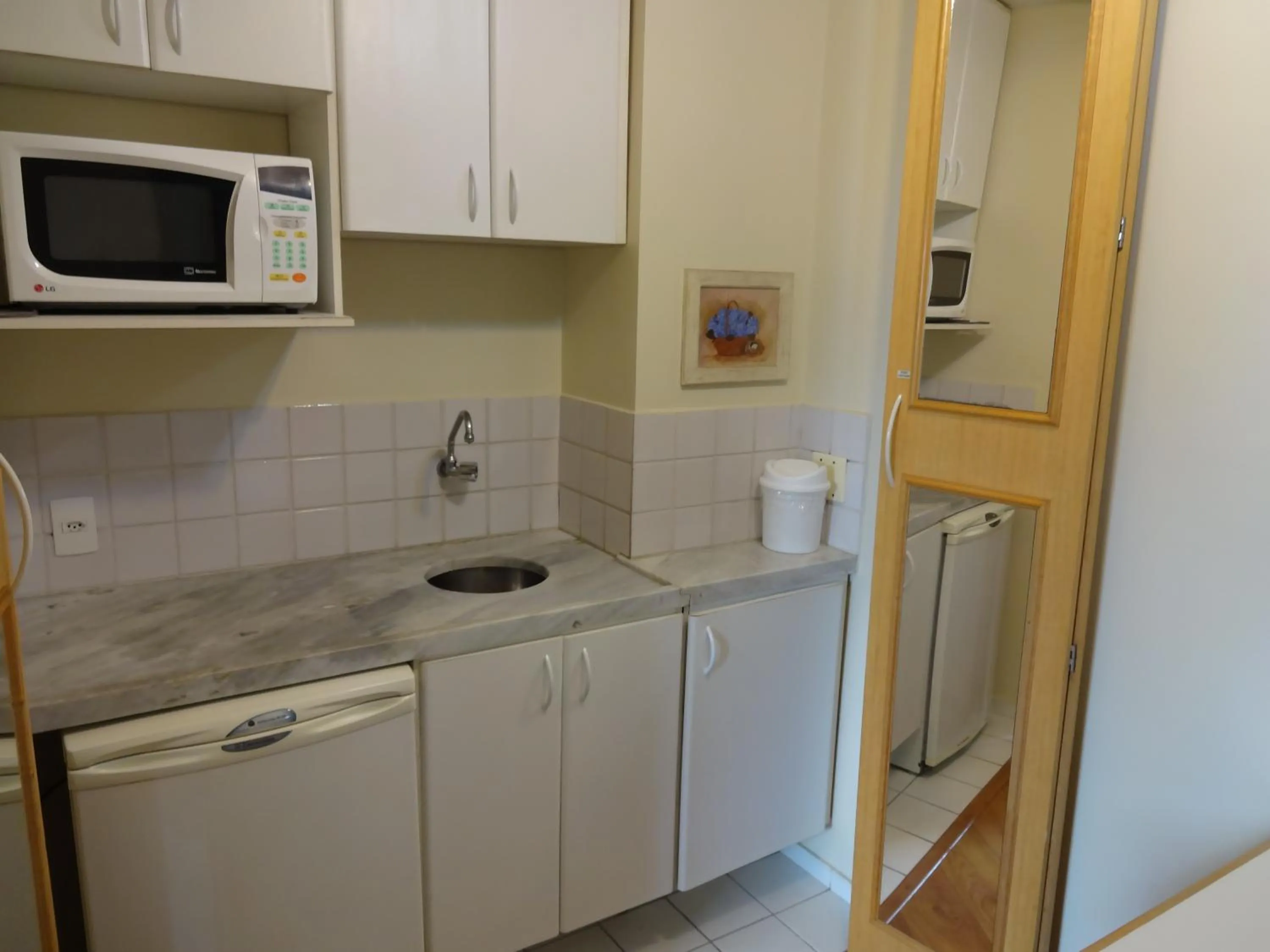 Kitchen or kitchenette in Residencial Bella Vista Suites