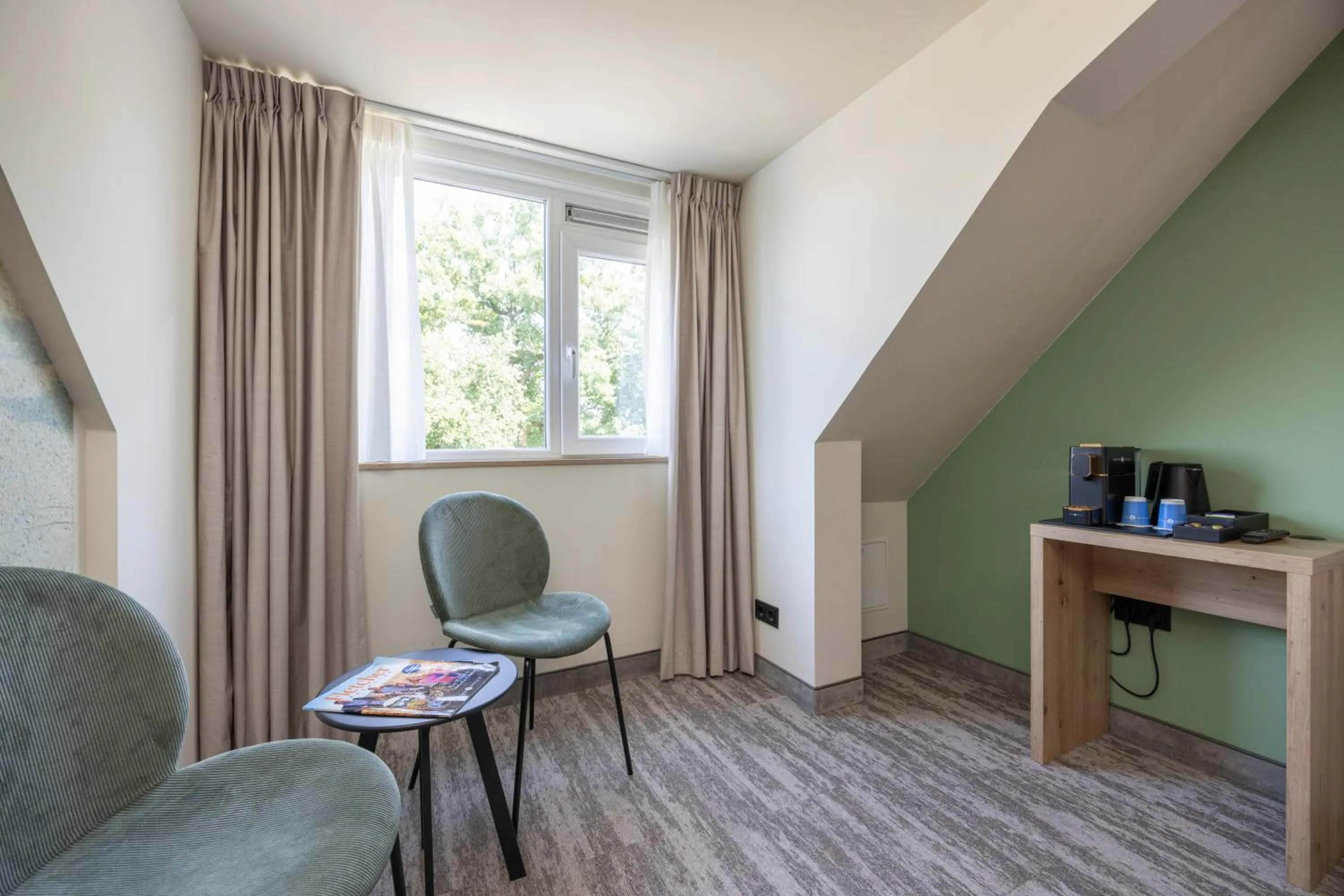 Seating area in Fletcher Hotel-Restaurant Het Witte Huis