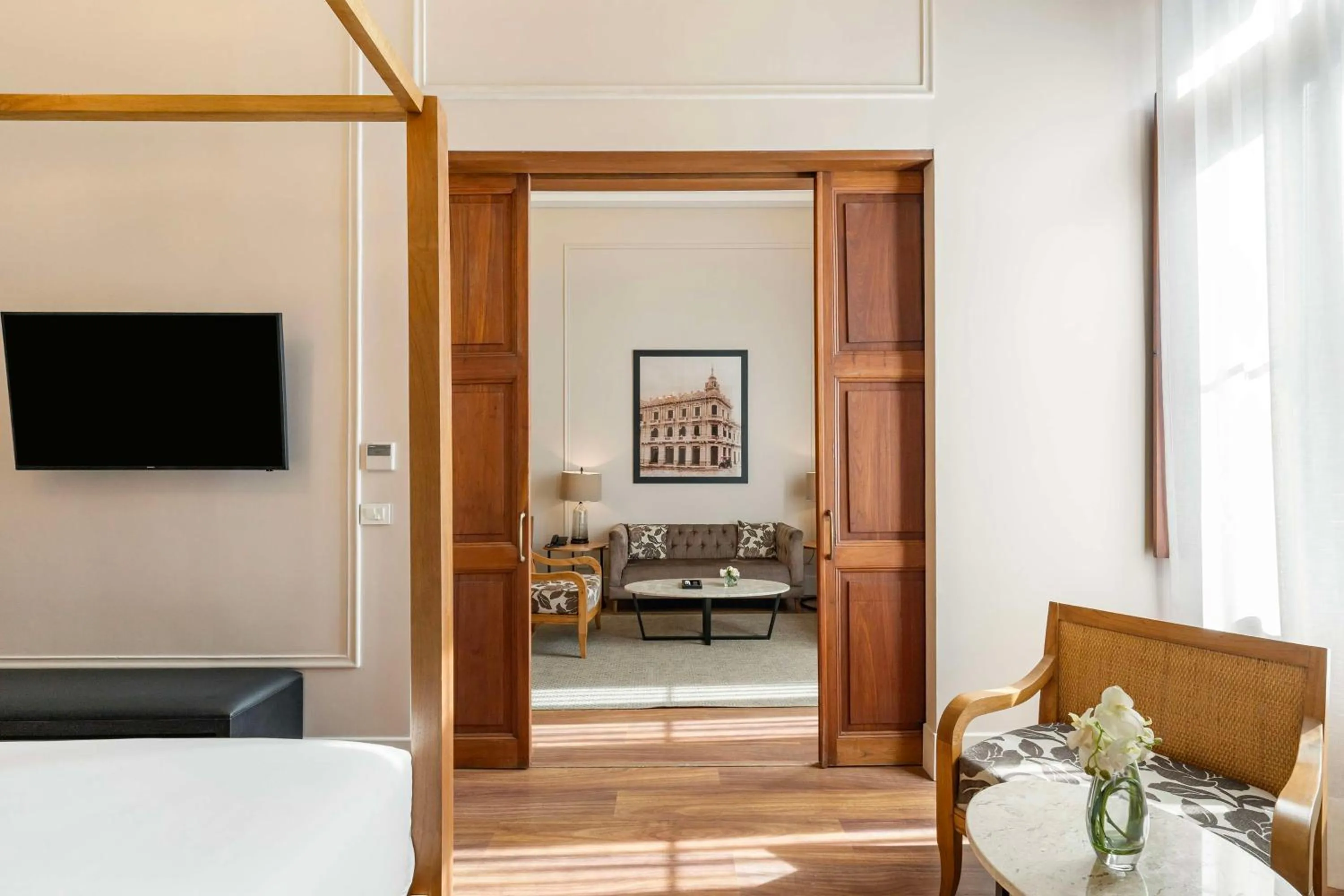 Living room, Bed in Palmaroga Hotel Asuncion, Tapestry Collection by Hilton