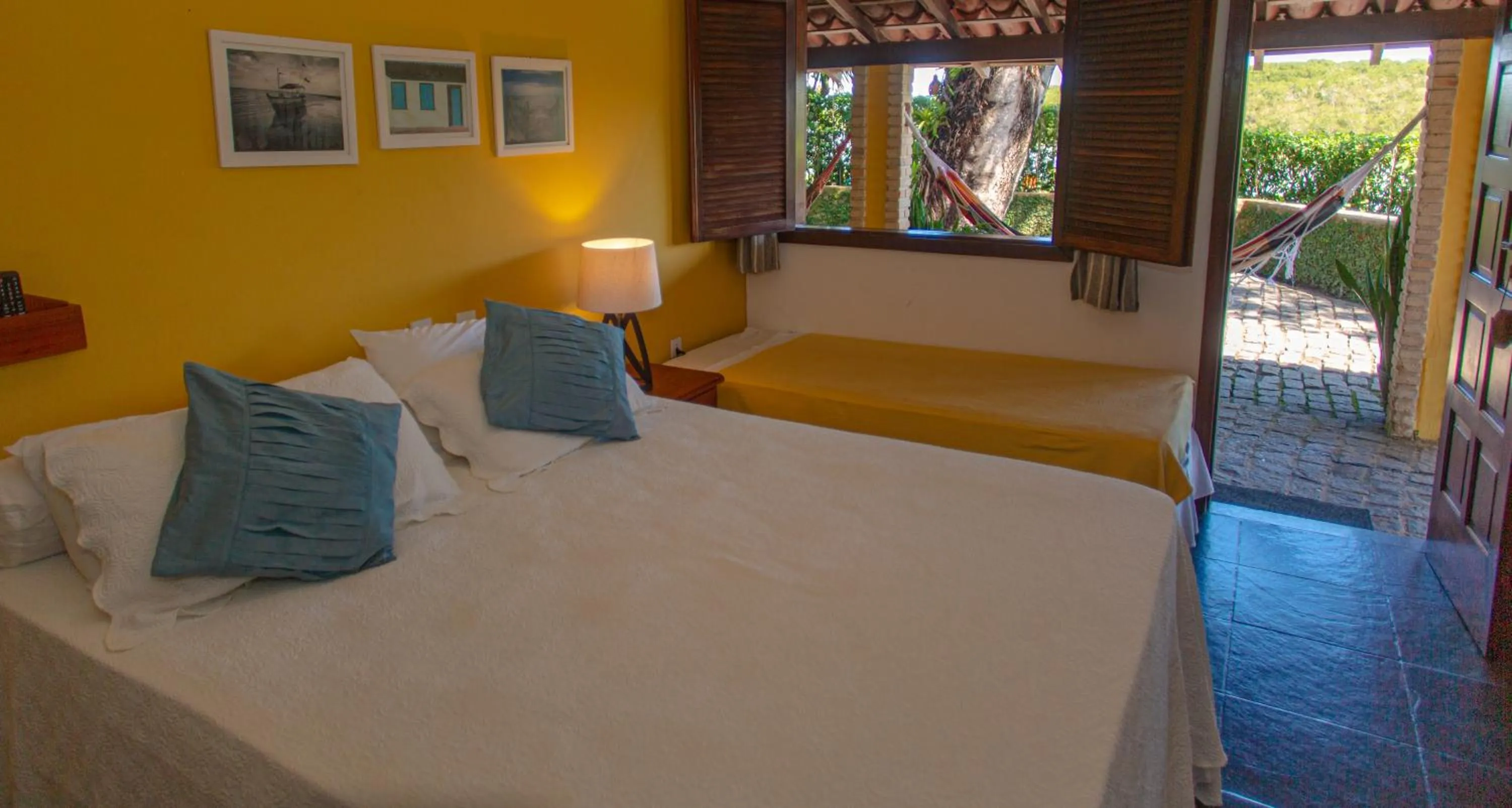 Bed in Pousada Canto do Rio