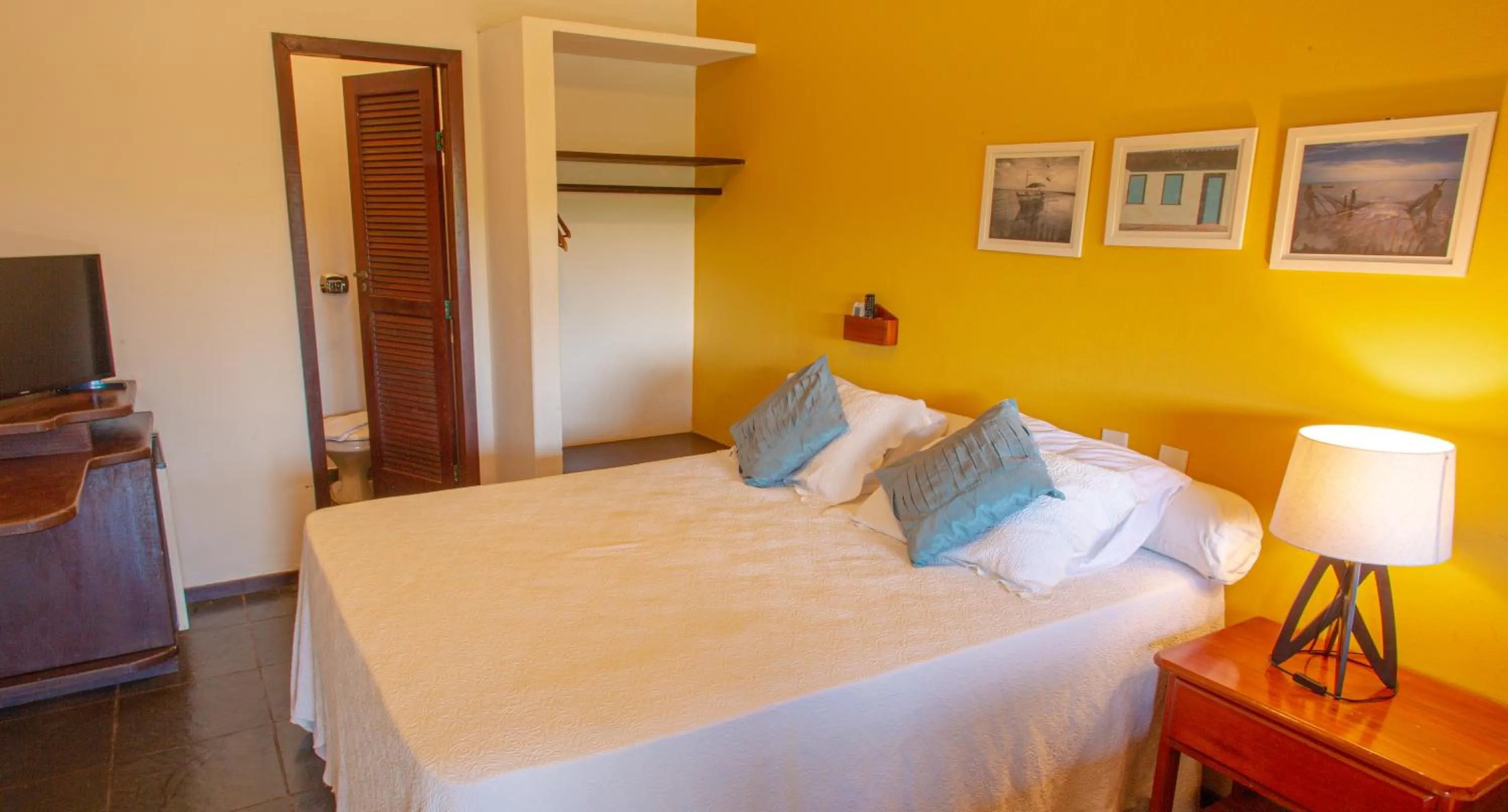 Bed in Pousada Canto do Rio