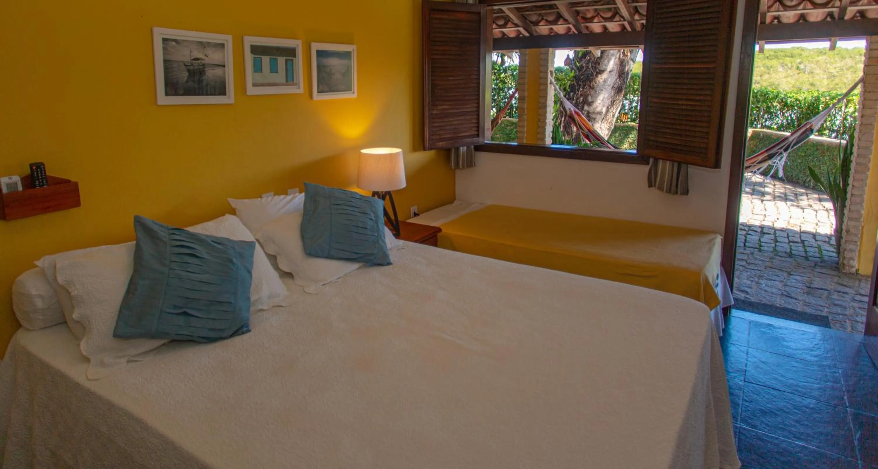 Bed in Pousada Canto do Rio