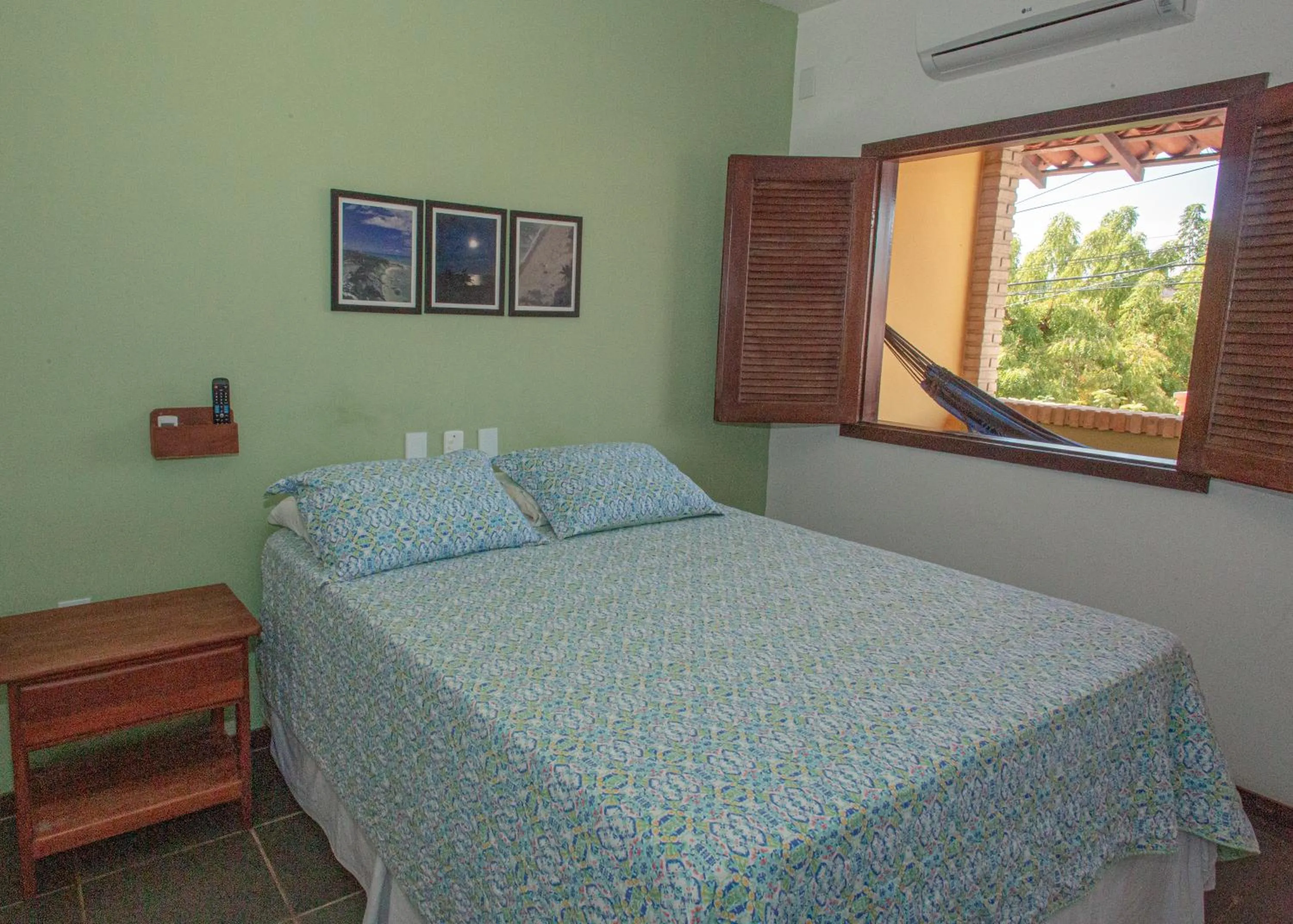 Bed in Pousada Canto do Rio