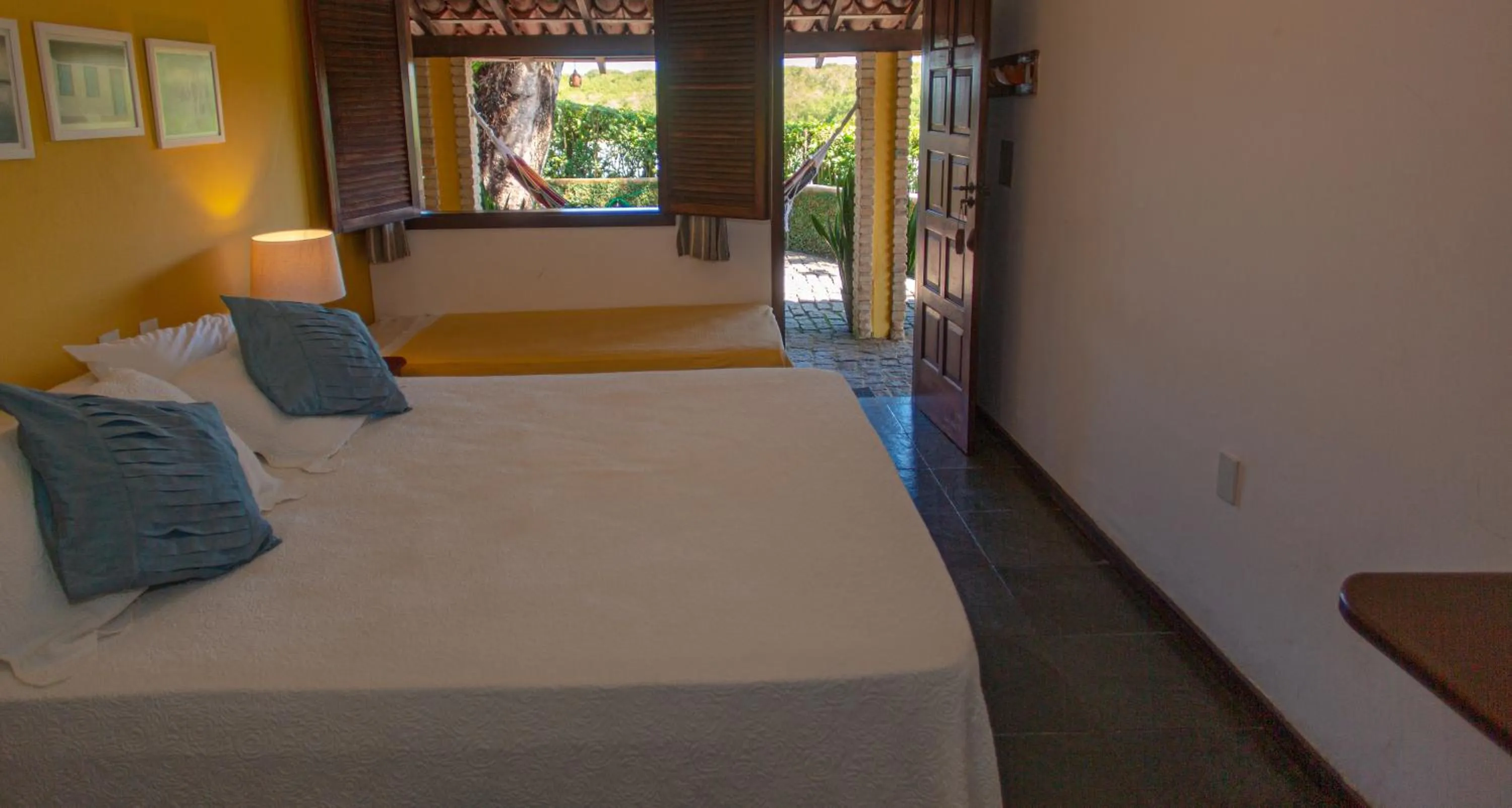 Bed in Pousada Canto do Rio