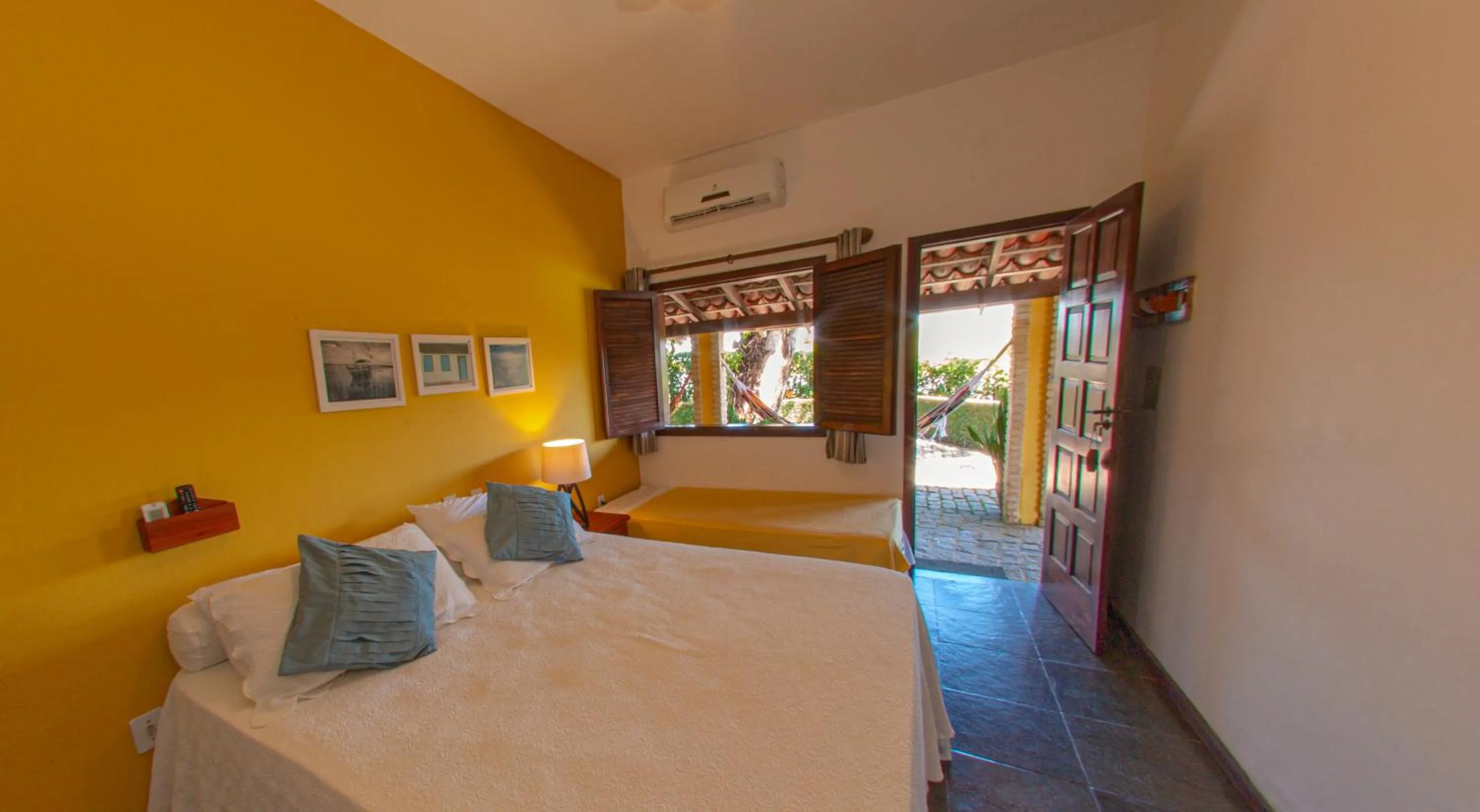 Bed in Pousada Canto do Rio