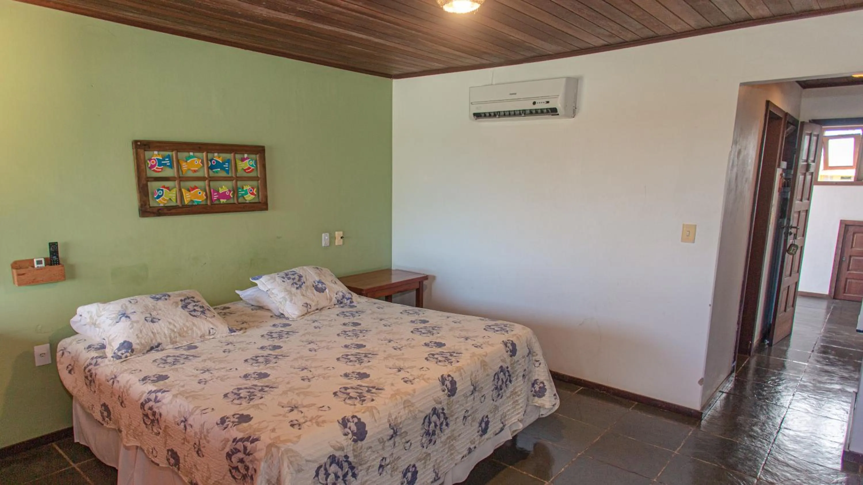 Bed in Pousada Canto do Rio