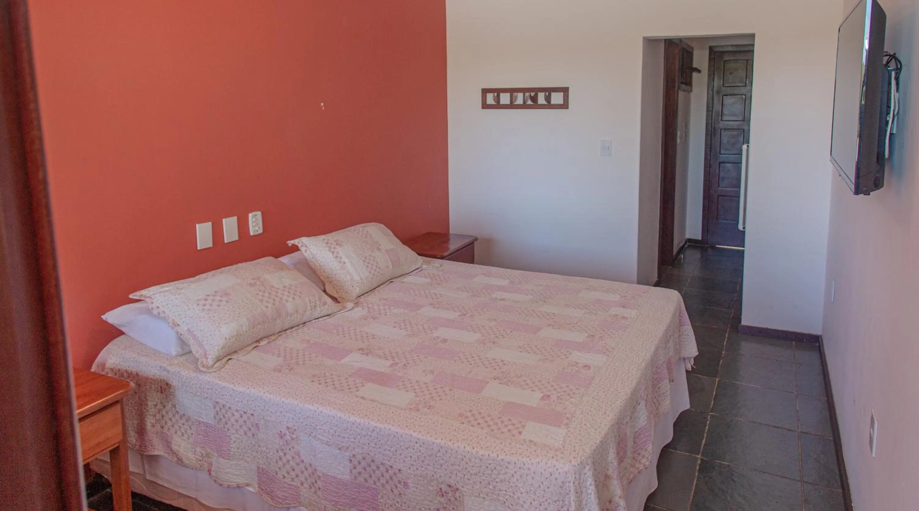 Bed in Pousada Canto do Rio