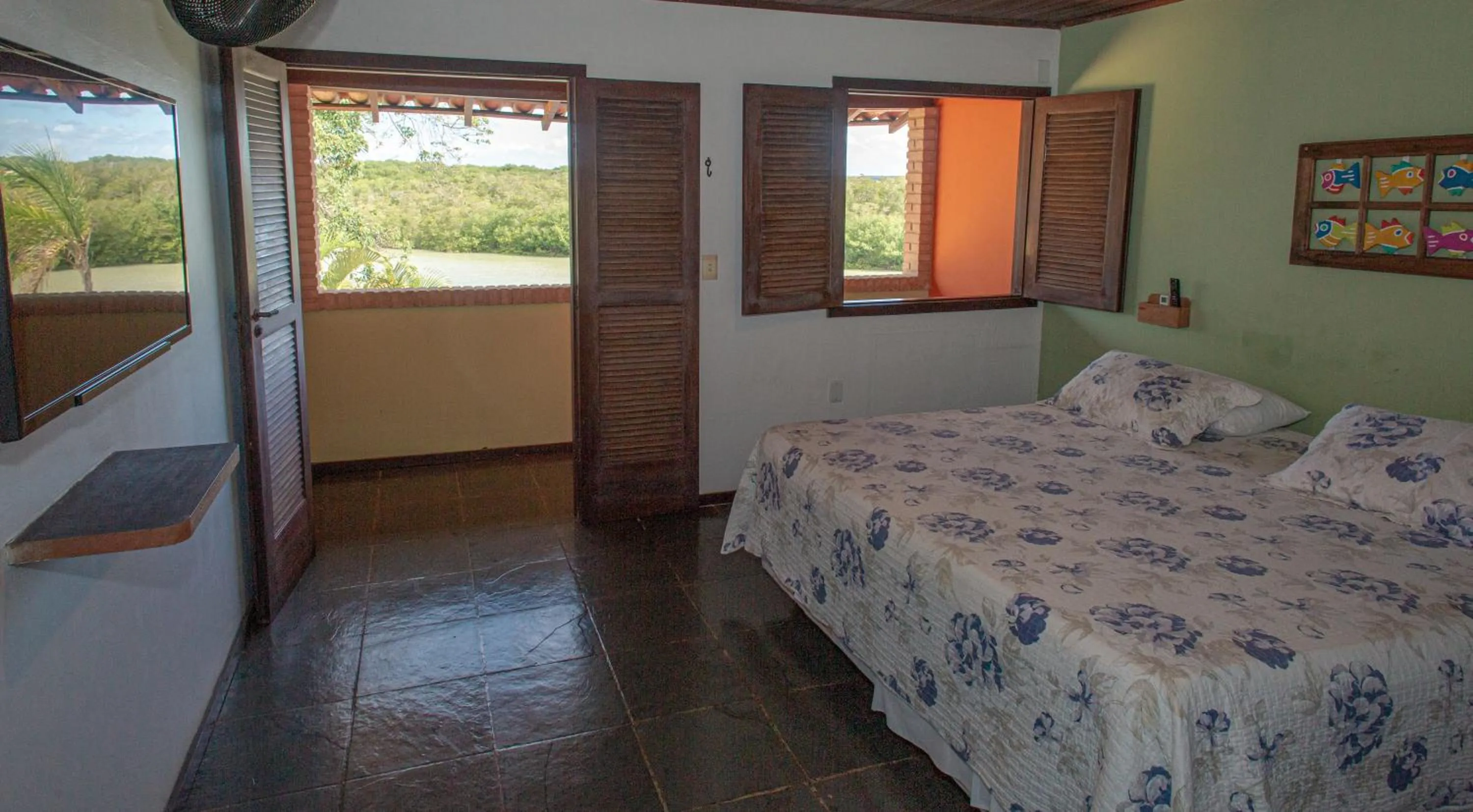 Bed in Pousada Canto do Rio