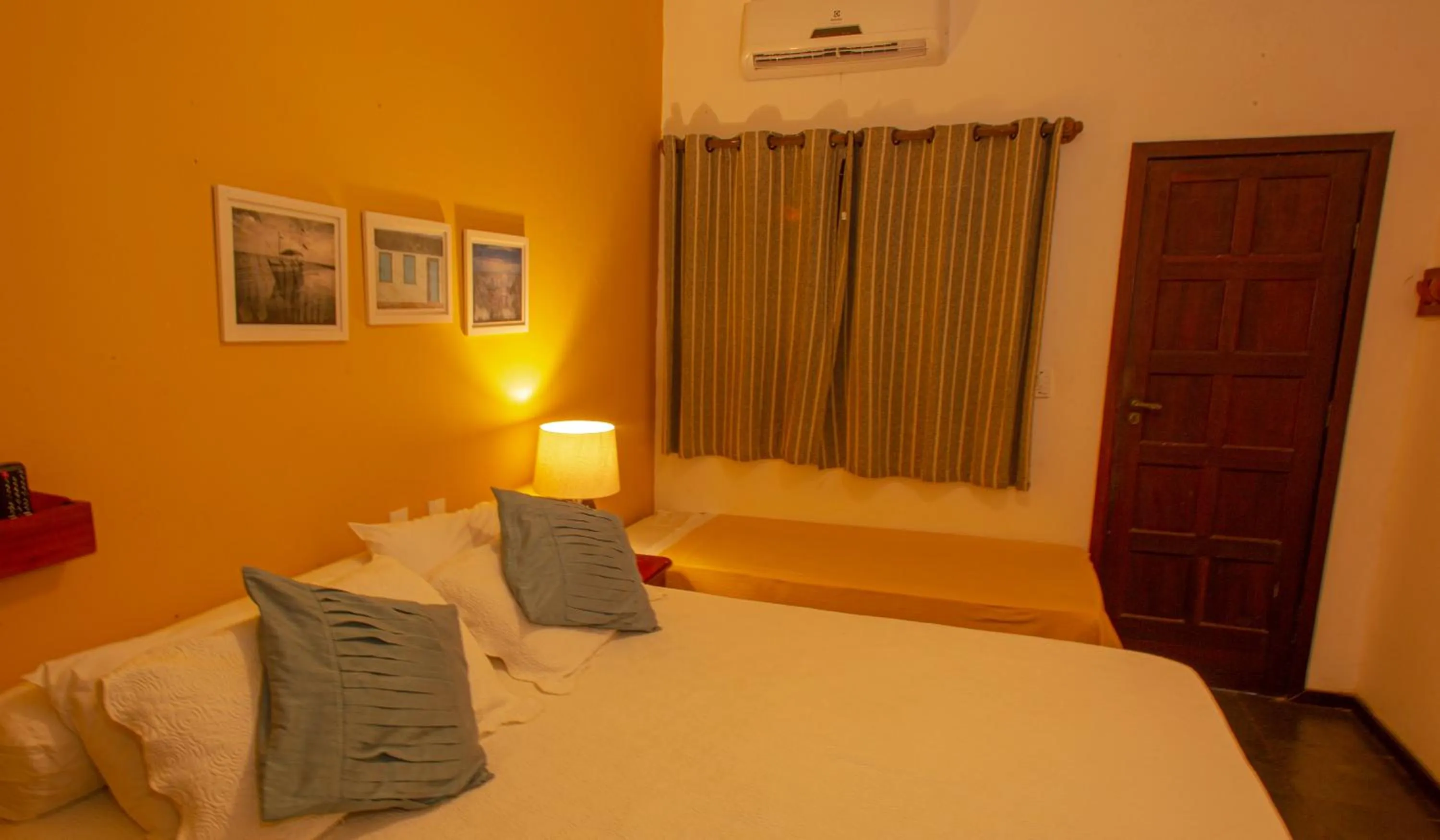 Bed in Pousada Canto do Rio