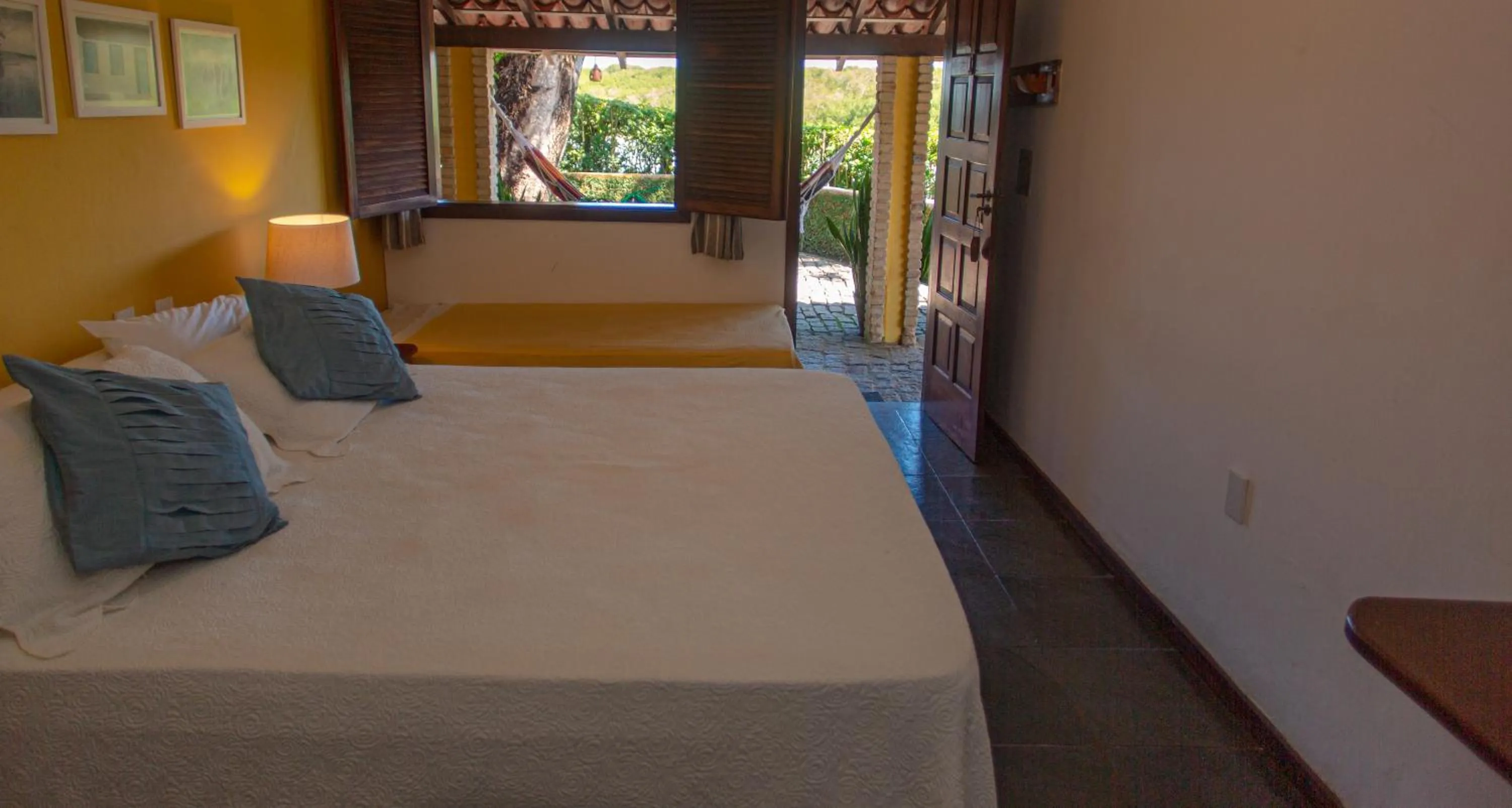 Bed in Pousada Canto do Rio