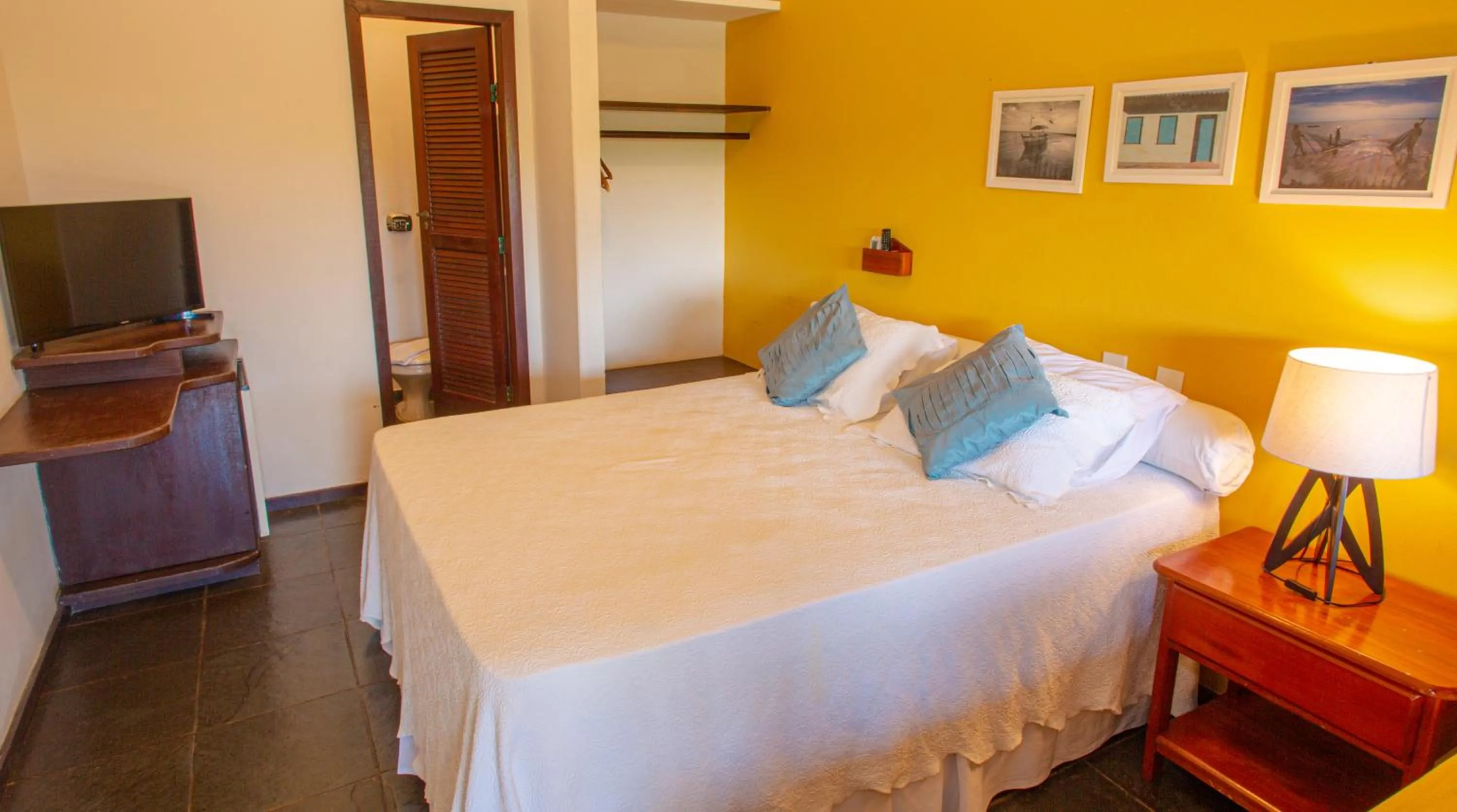 Bed in Pousada Canto do Rio