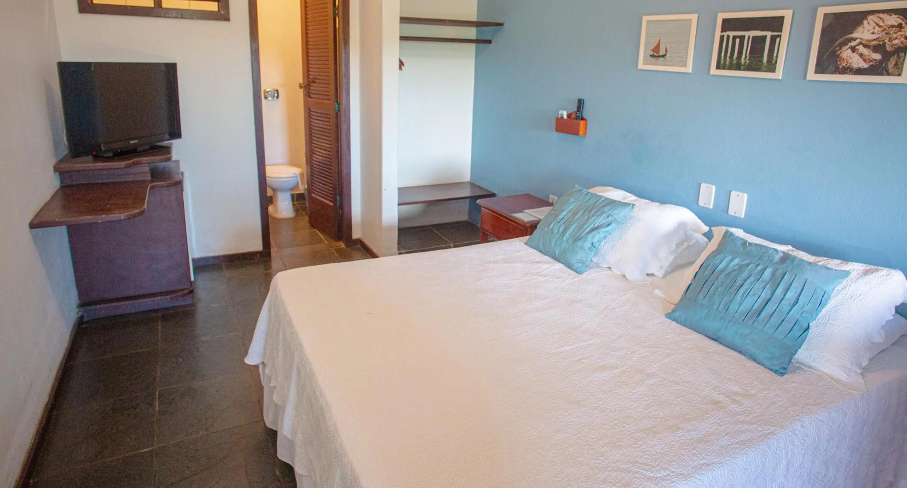 Bed in Pousada Canto do Rio