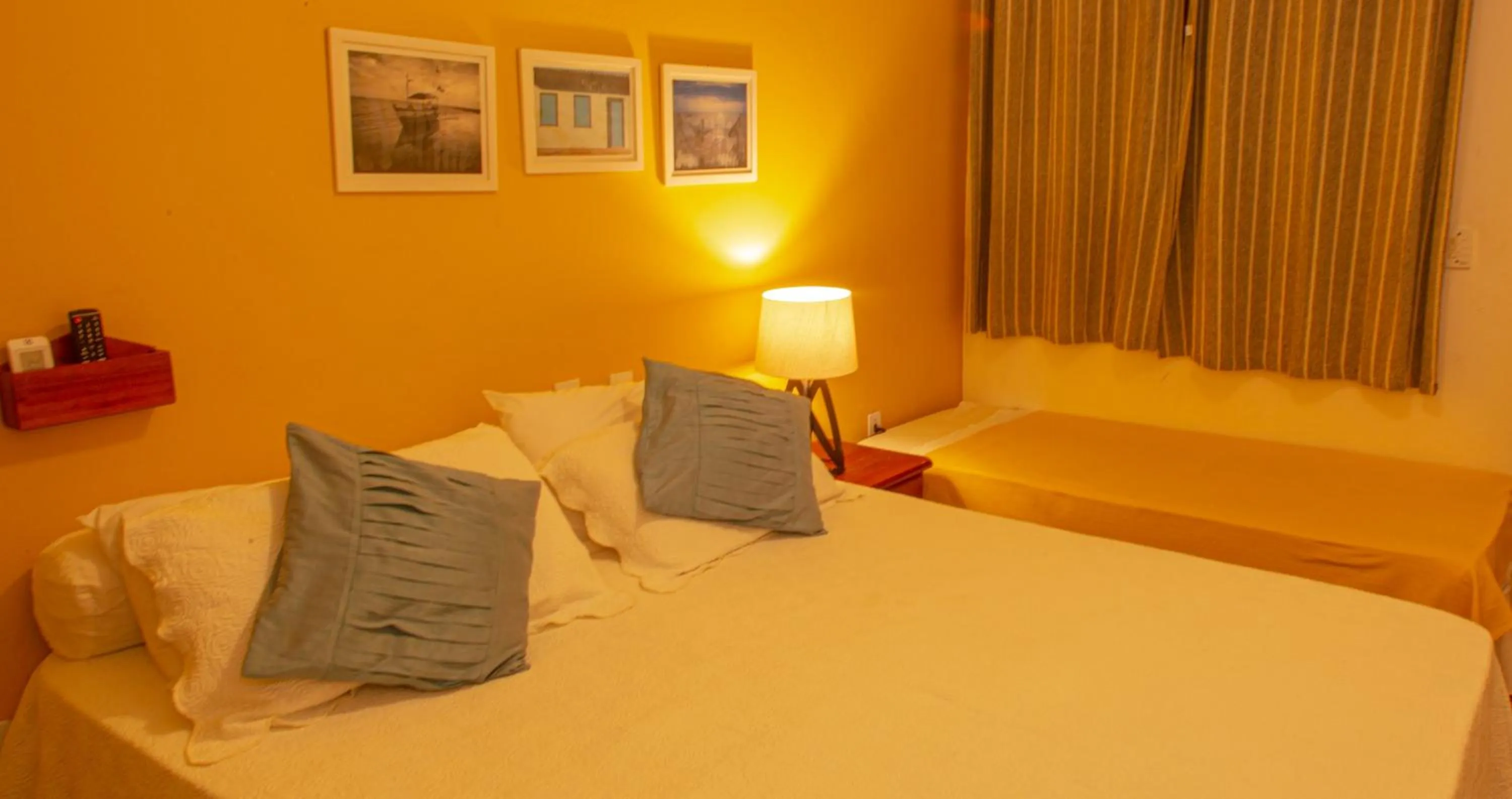 Bed in Pousada Canto do Rio