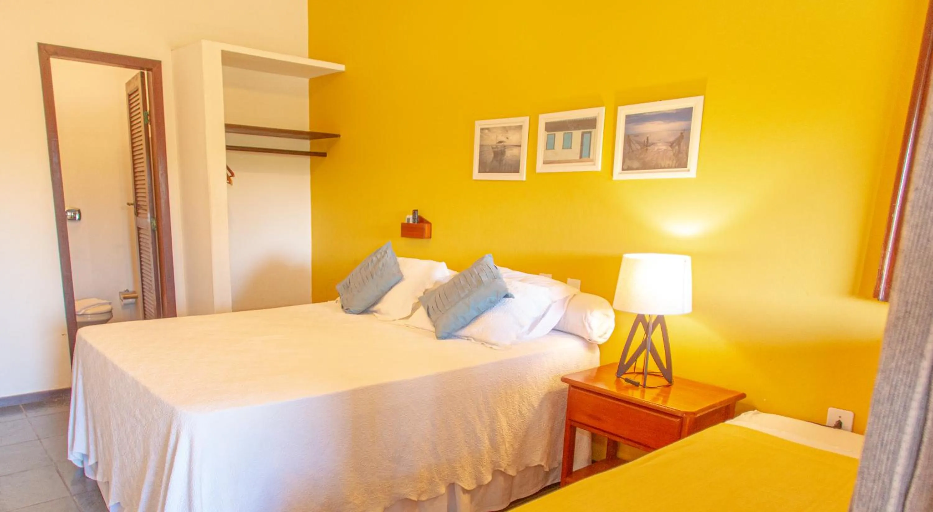 Bed in Pousada Canto do Rio