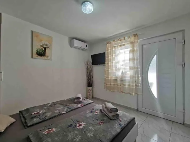 Bed in Apartmani Jordanka