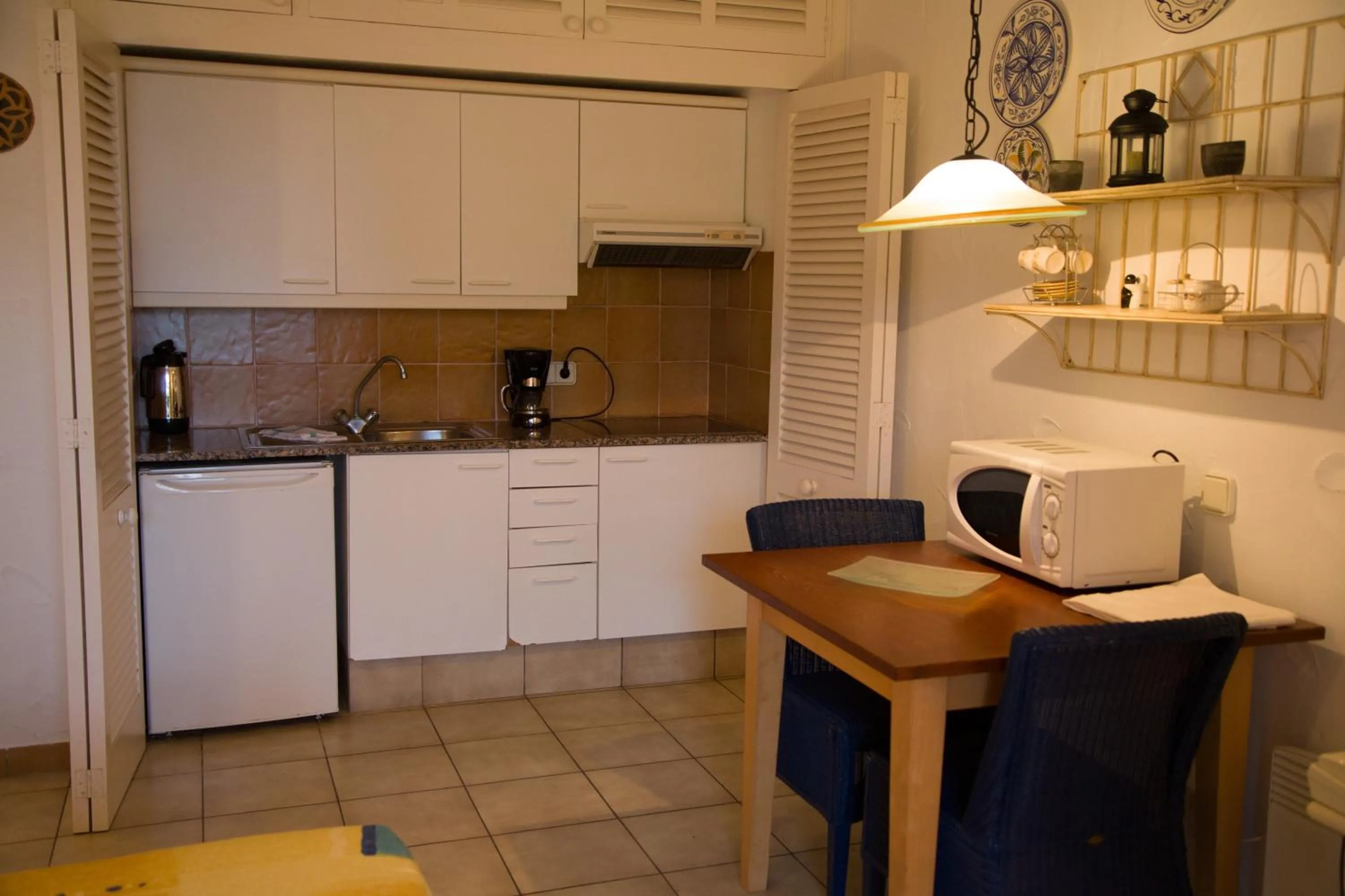 Kitchen or kitchenette in Apartamentos Parque Mar