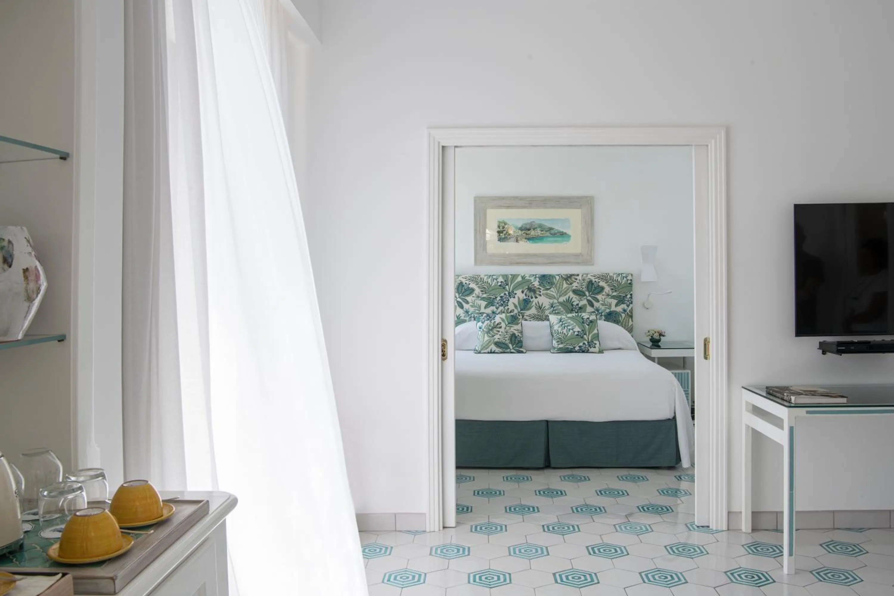 Seating area, Bed in Hotel Santa Caterina