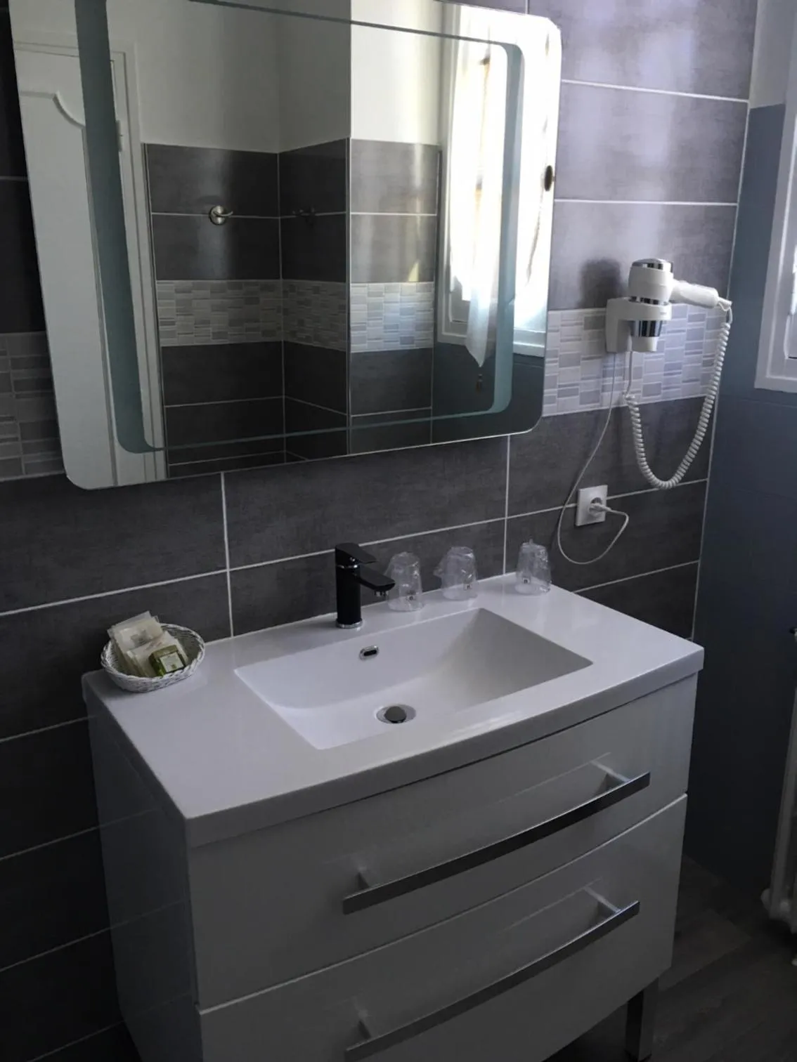 Bathroom in Logis Hôtel le Relais du Bas Limousin