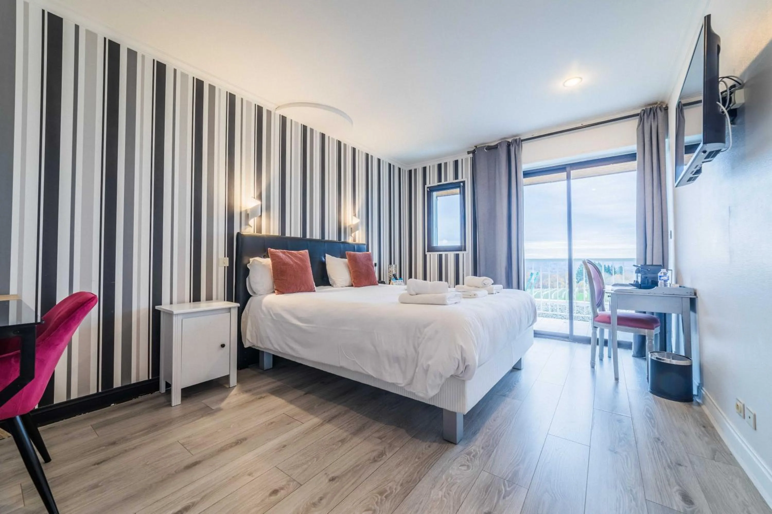 Bed in Logis Hôtel le Relais du Bas Limousin