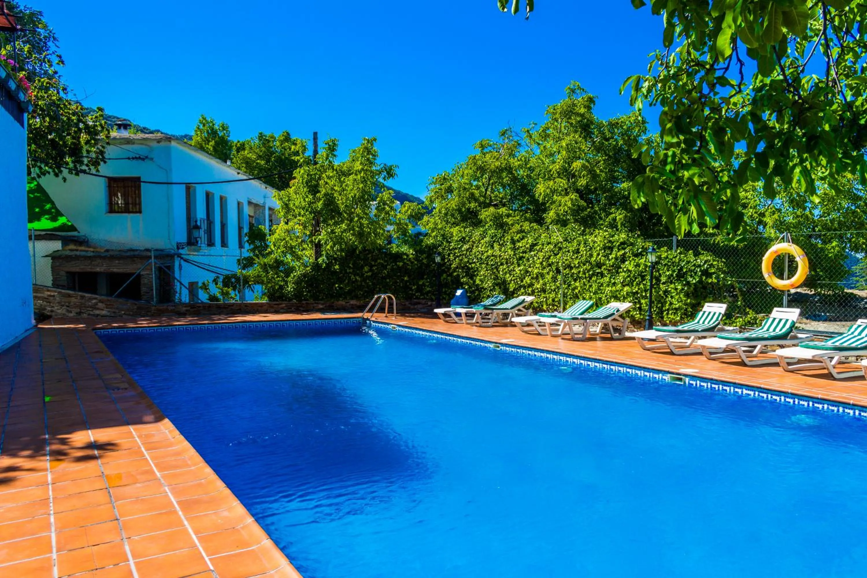 Swimming pool in Hotel Rural Real de Poqueira
