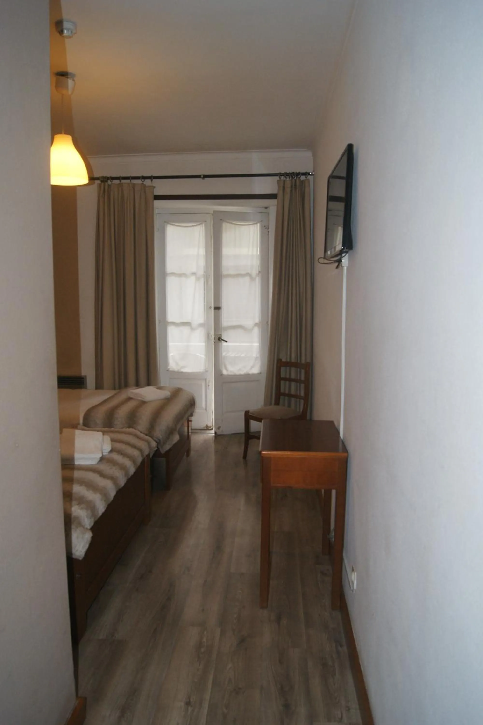 Bed in Hotel Chique Aliados