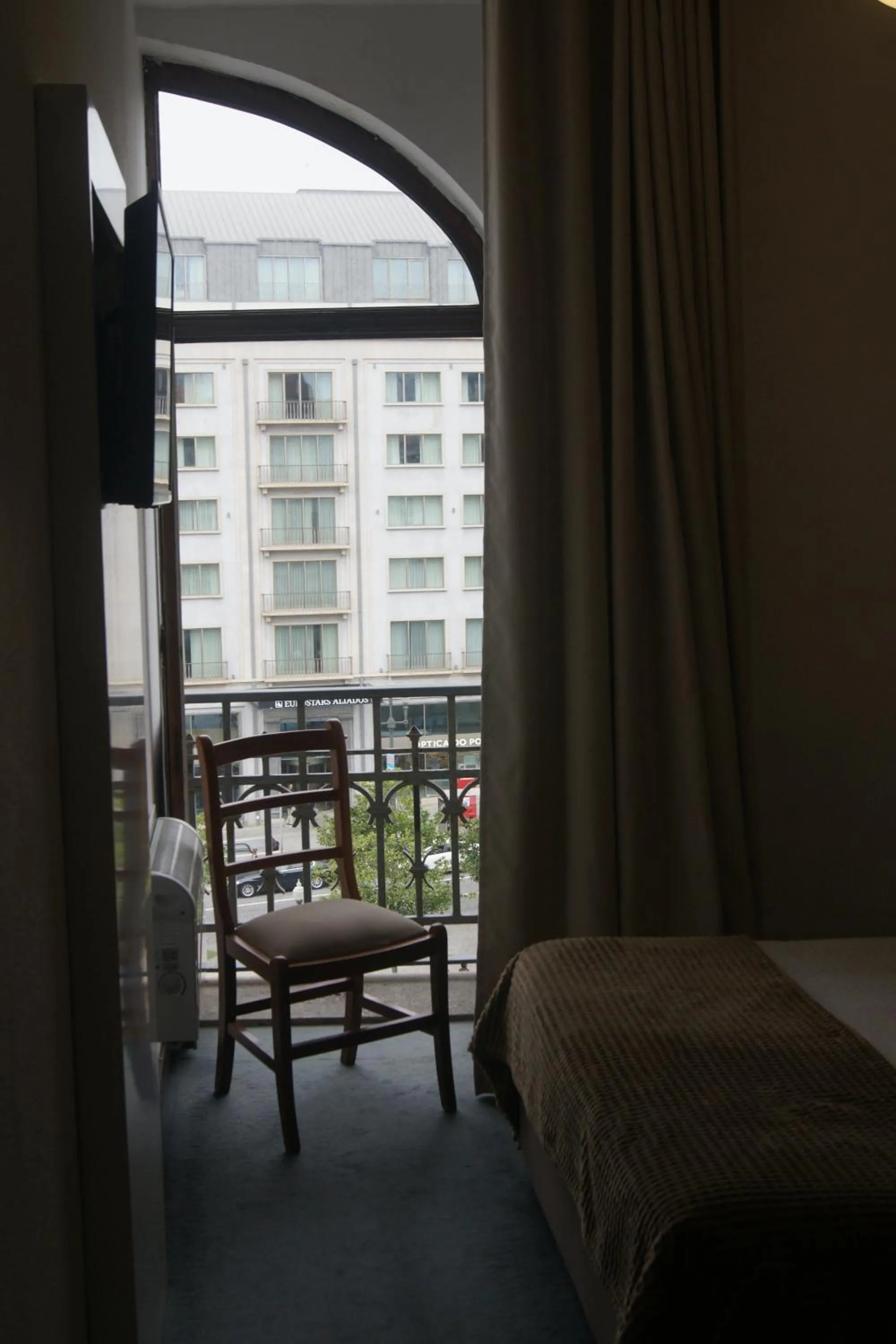 Bed in Hotel Chique Aliados