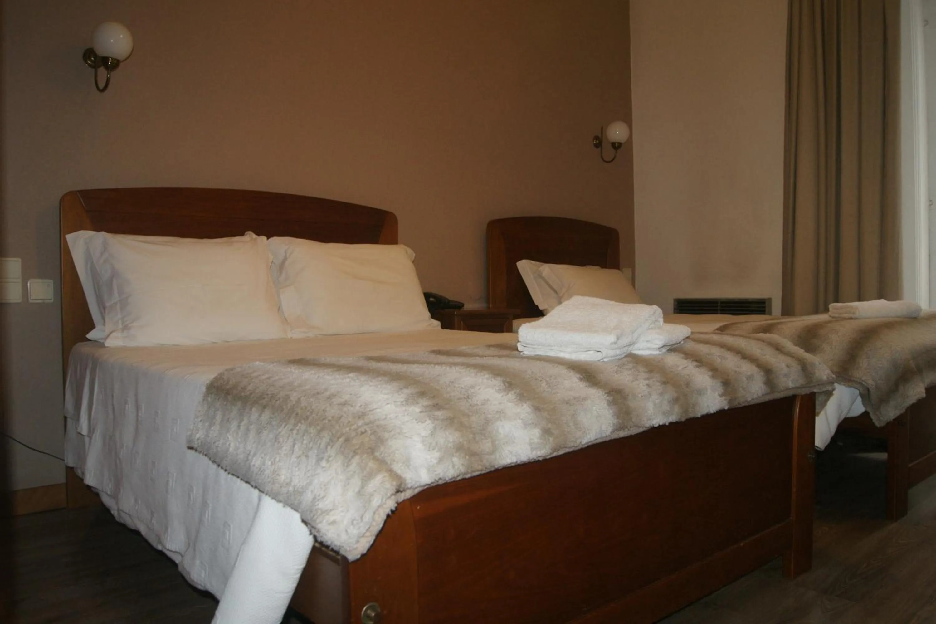 Bed in Hotel Chique Aliados