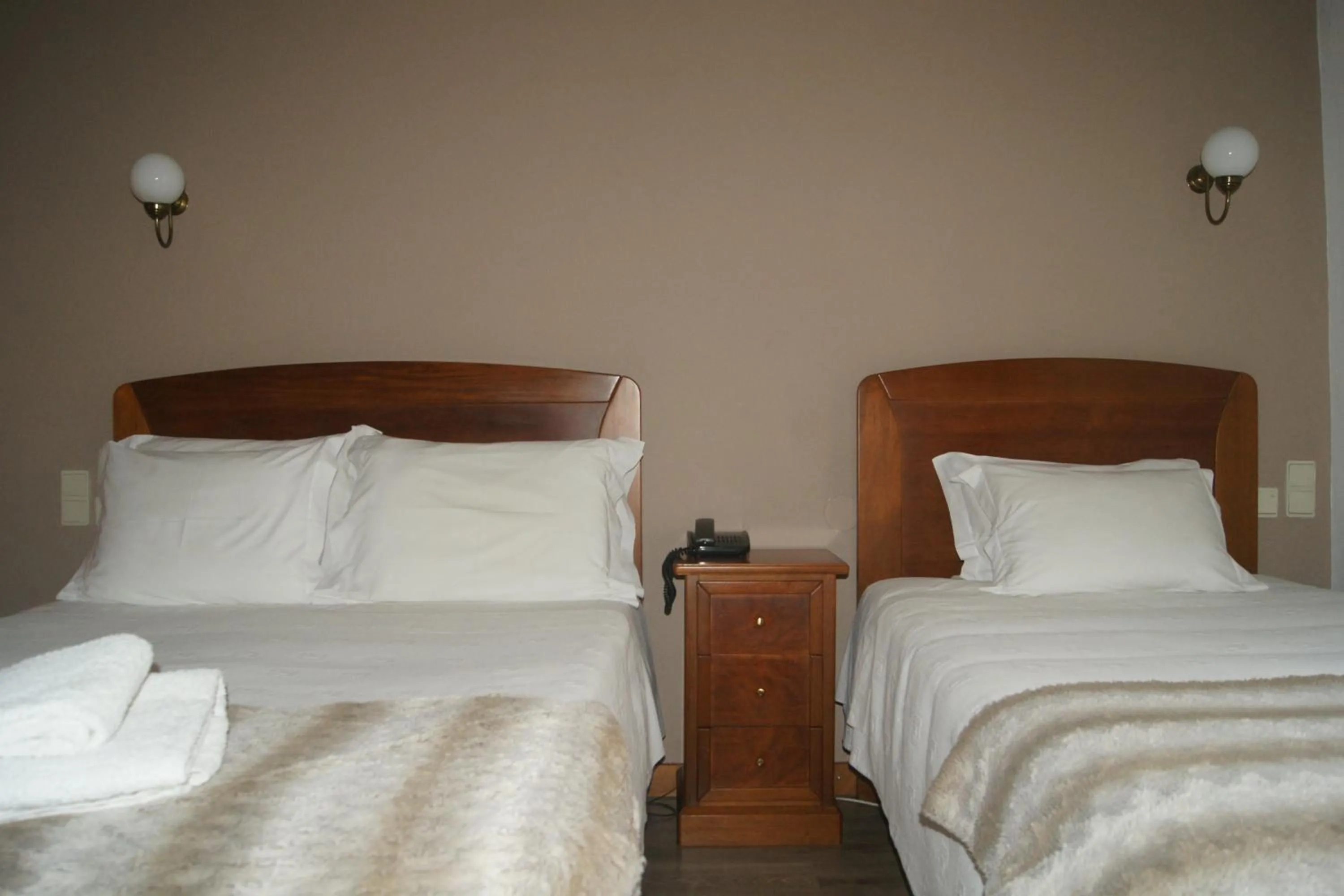 Bed in Hotel Chique Aliados