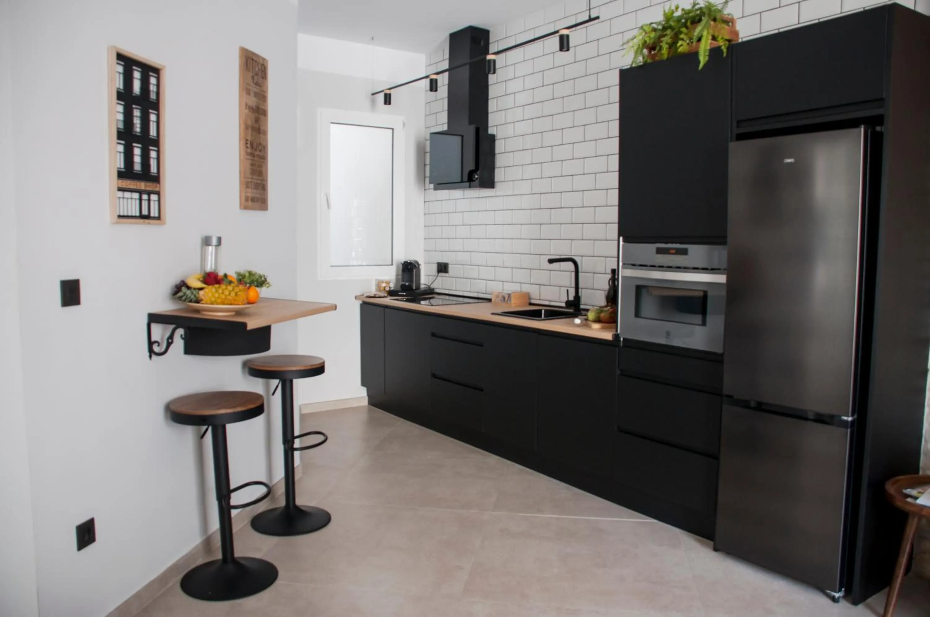 Kitchen or kitchenette in Valencia Apartamentos Goya