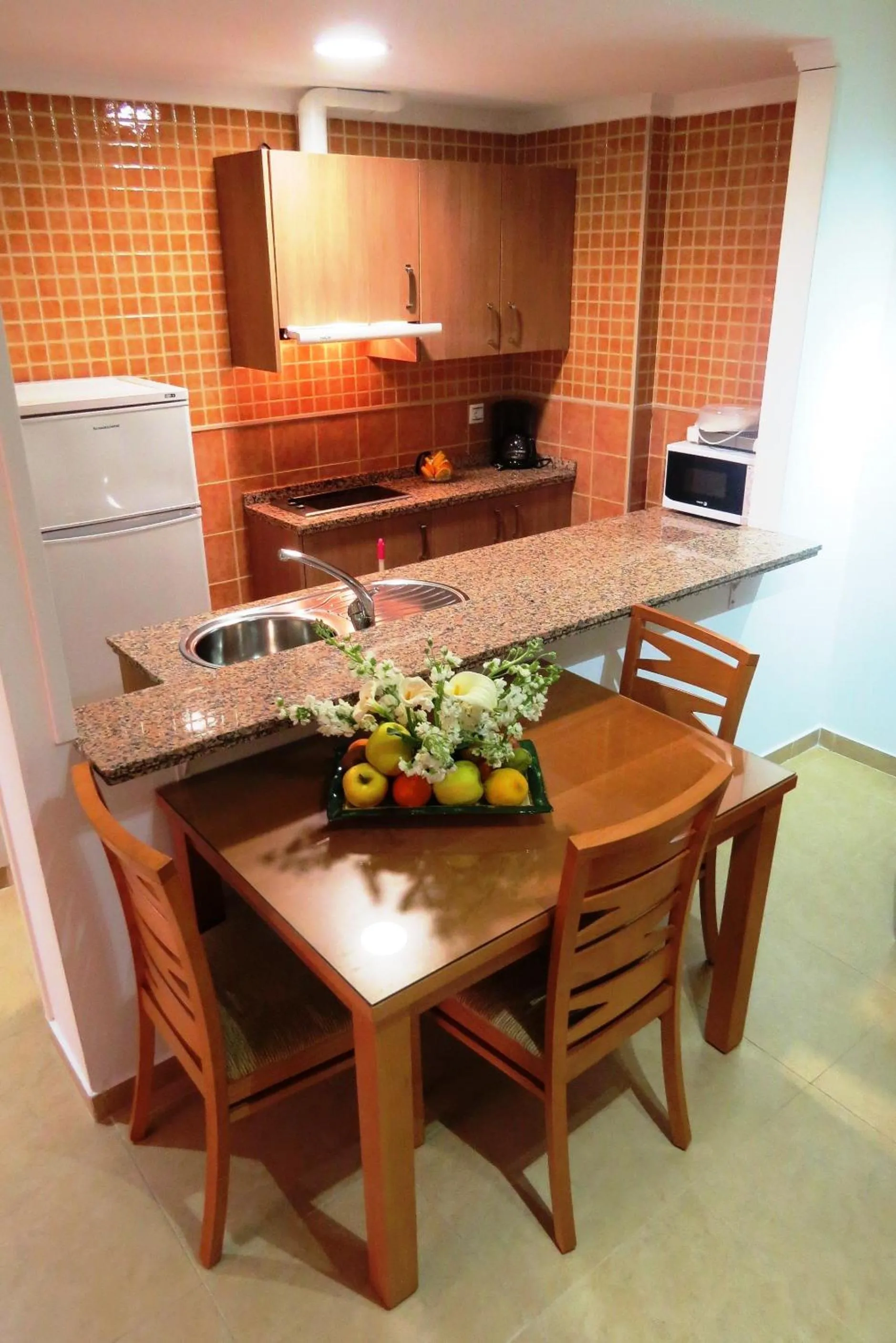 Kitchen or kitchenette in Apartamentos Turisticos Las Yucas