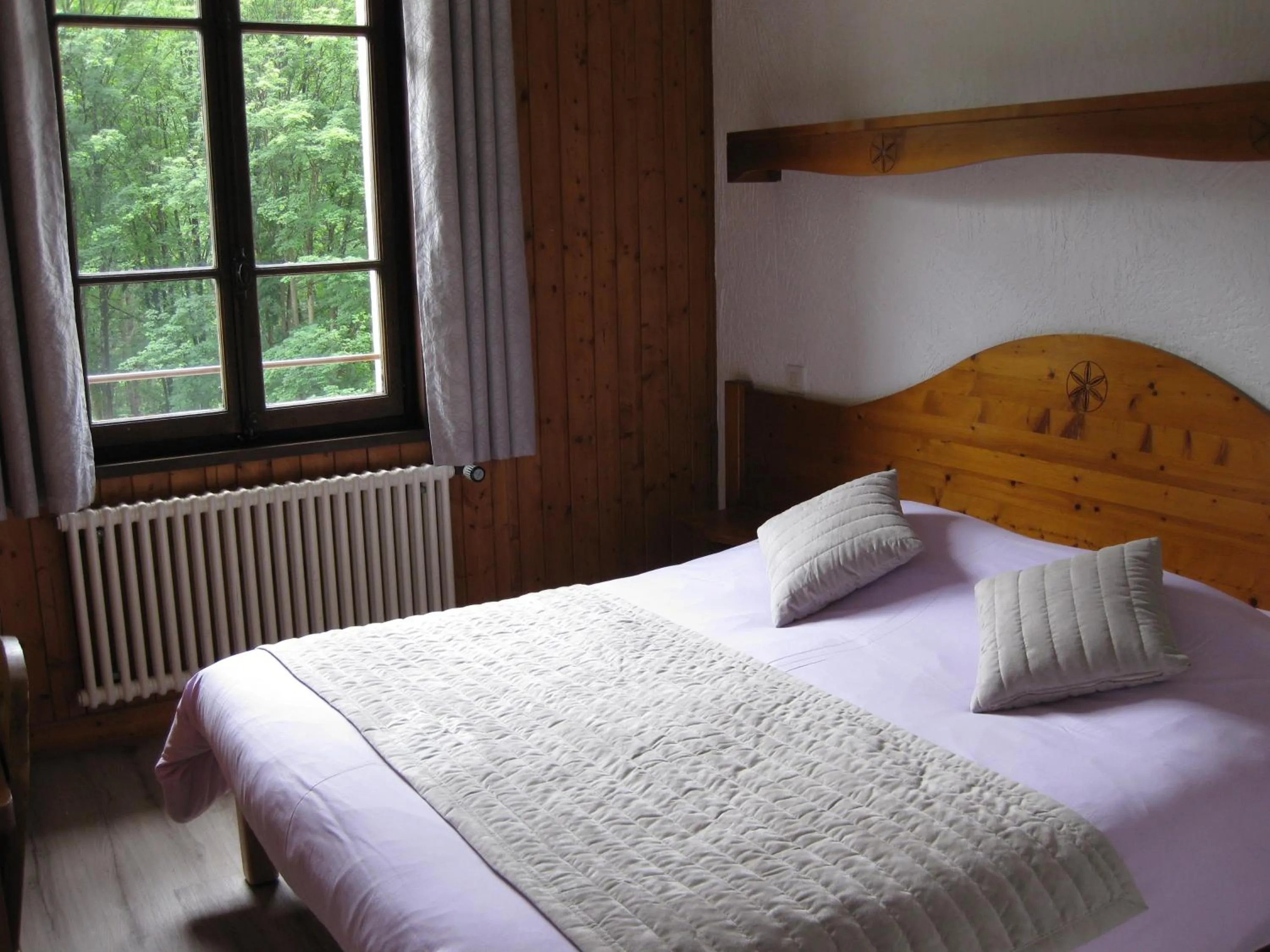 Bed in Hotel des Lacs